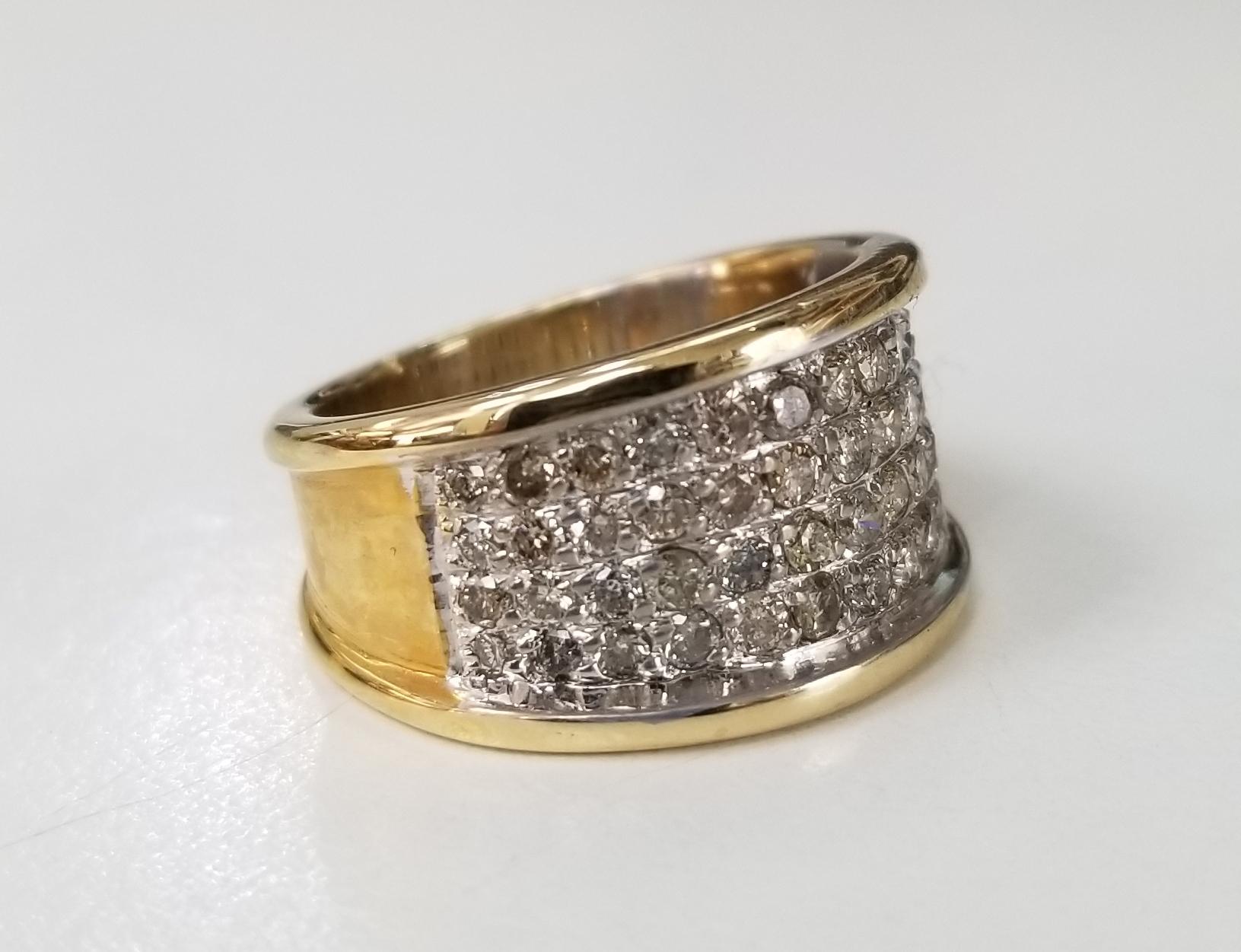 14 karat yellow gold diamond pave' set ring, containing 52 round full cut diamonds  weighing 1.15cts.  This ring is a size 6 but we will size to fit for free.