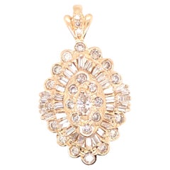 14 Karat Yellow Gold Diamond Pendant featuring 3 different Diamond cuts