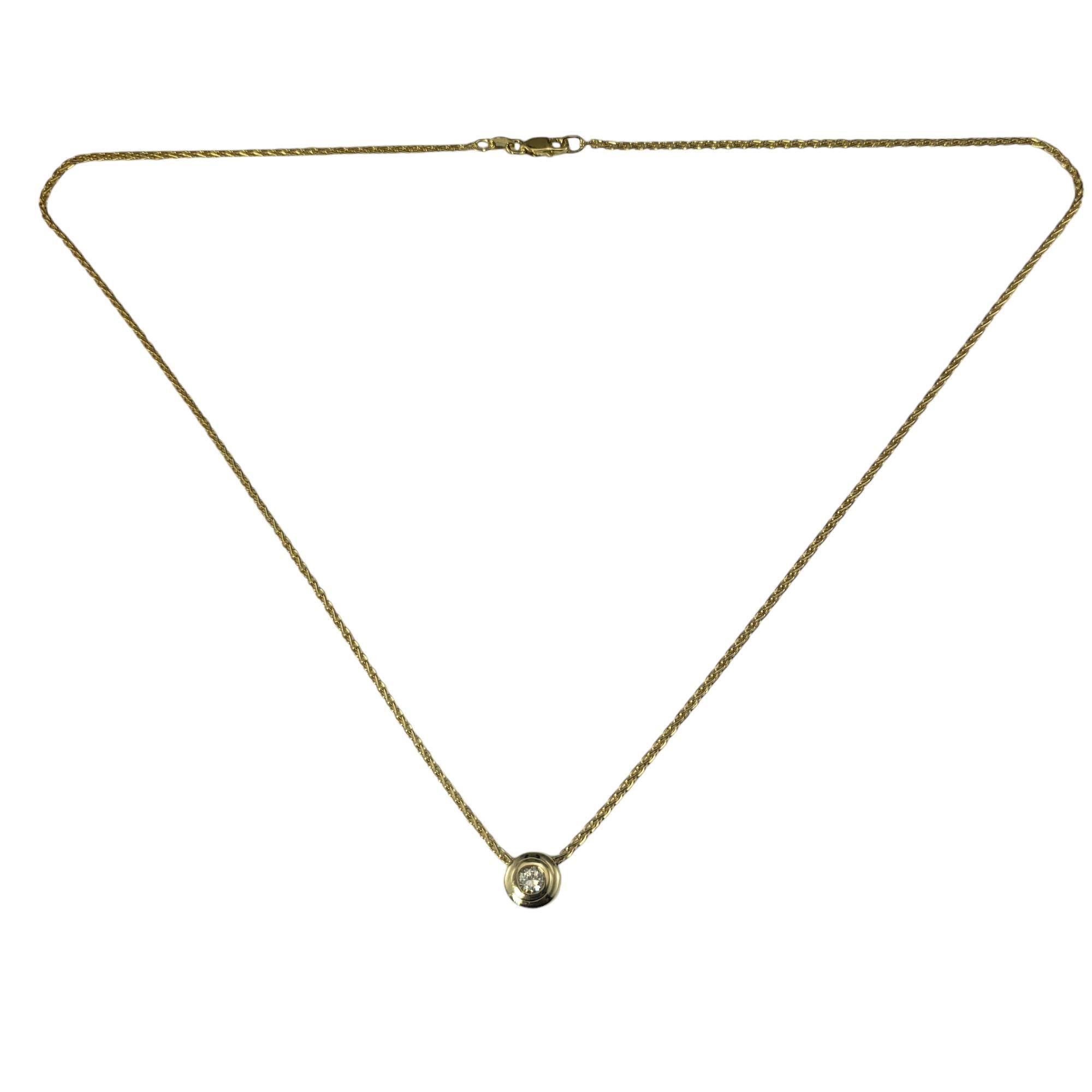 14 Karat Yellow Gold Diamond Pendant Necklace-

This stunning solitaire necklace features one round brilliant cut diamond bezel set in classic 14K yellow gold.

Approximate diamond weight: .16 ct. - .20 ct.*

Diamond color: H

Diamond clarity: