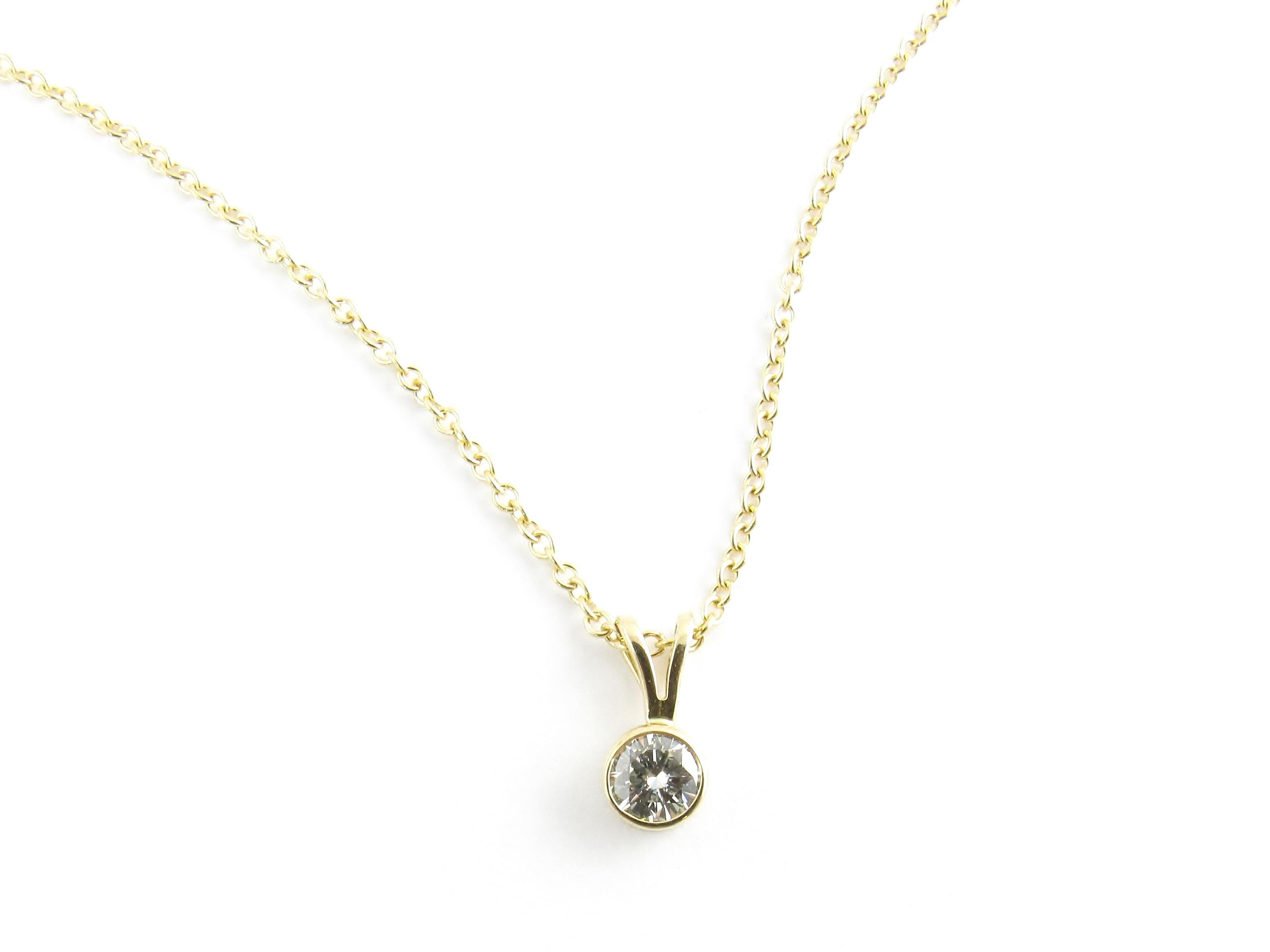 Vintage 14 Karat Yellow Gold Diamond Pendant Necklace

This sparkling round brilliant cut diamond pendant is bezel set in 14K yellow gold. Suspends from a classic yellow gold necklace.

Approximate total diamond weight: .40 ct.

Diamond color: