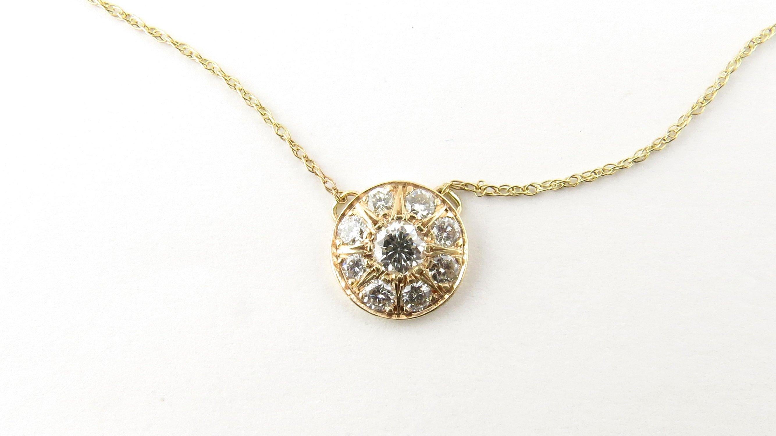 Vintage 14 Karat Yellow Gold and Diamond Pendant Necklace- This sparkling pendant (10 mm) features eight round brilliant cut diamonds set in classic 14K yellow gold on a delicate cable necklace. Approximate total diamond weight: .39 ct. Diamond