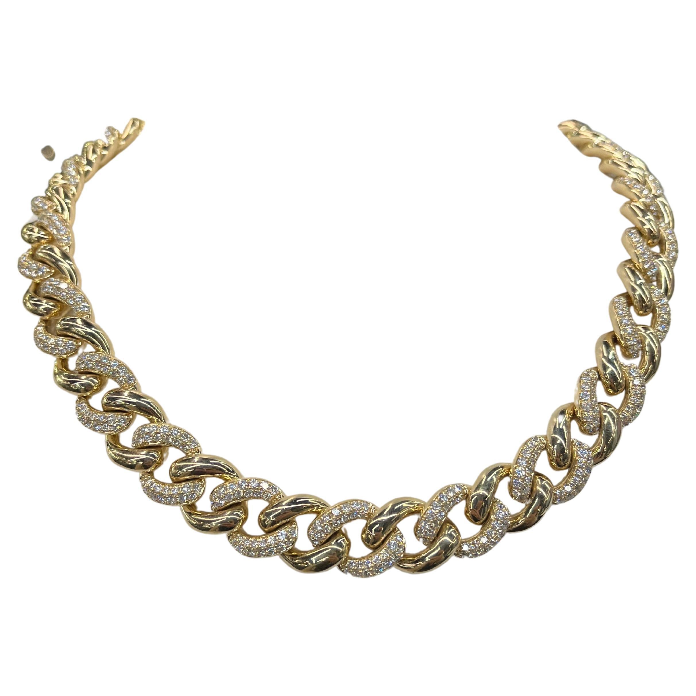14 Karat Yellow Gold Cuban link necklace featuring alternating polished & diamond gold links with 642 Round Brilliants weighing 11.91 Carats.
Color G-H
Clarity SI
Very Sparkly! 
Comes in White Gold too.
DM for pricing. 