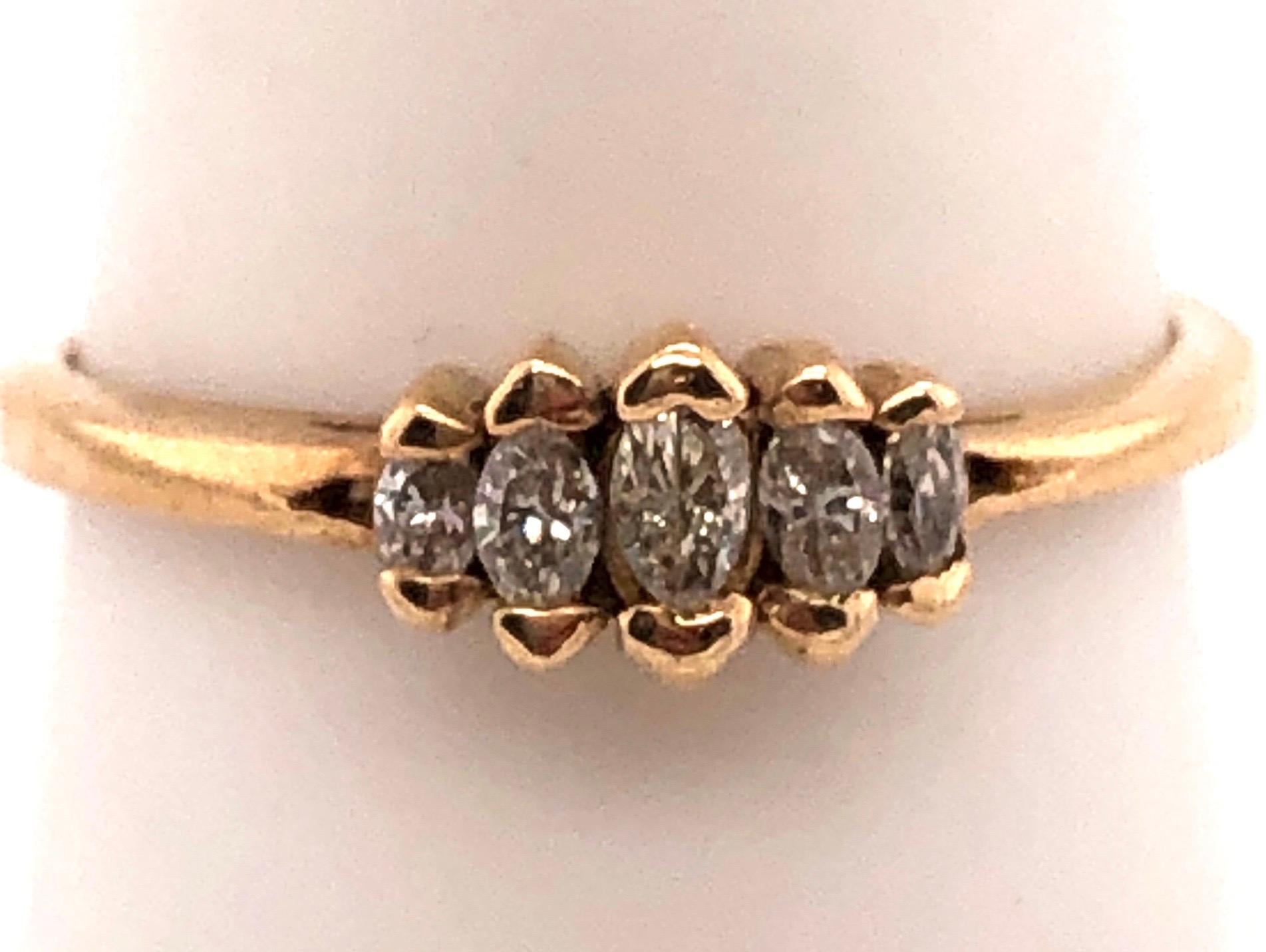 14 Karat Yellow Gold Five Stones Diamond Ring 0.25 TDW.
Size 9
3 grams total weight.