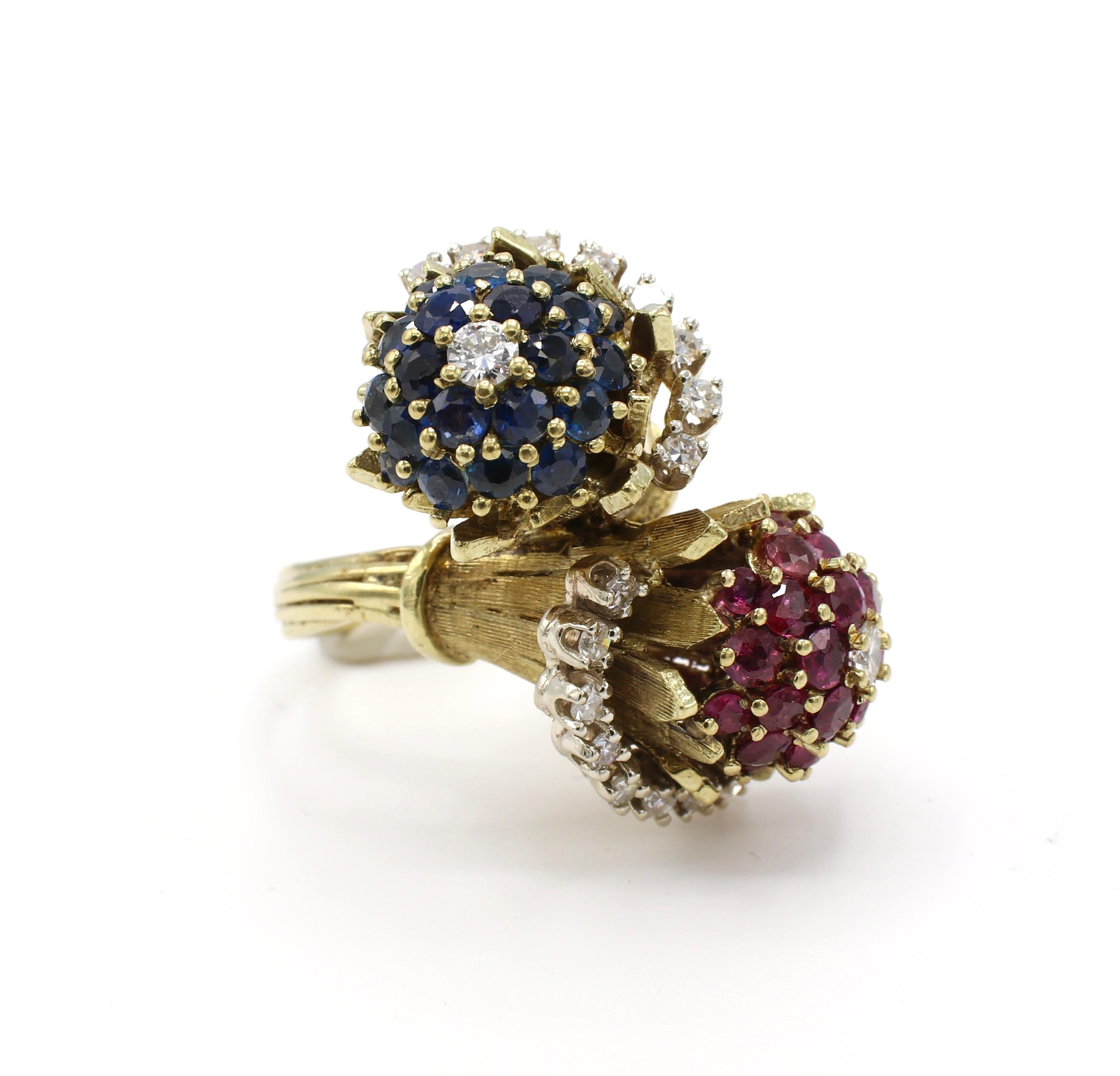 14 Karat Yellow Gold Diamond, Ruby & Sapphire Bypass Ring Size 7

Metal: 14 karat yellow gold
Weight: 19.53 grams
Diamonds: Approx. .75 CTW G-H VS-SI
Top of ring measures approx. 31mm x 18mm 
Band is 3.3mm at base
Size: 7 (US)
