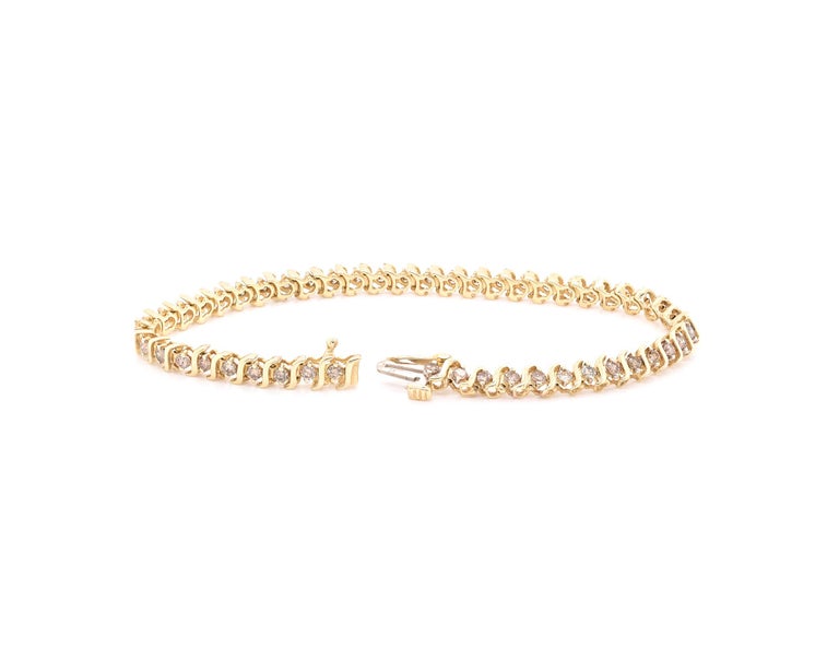 14 Karat Yellow Gold Diamond S Link Tennis Bracelet For Sale at 1stDibs