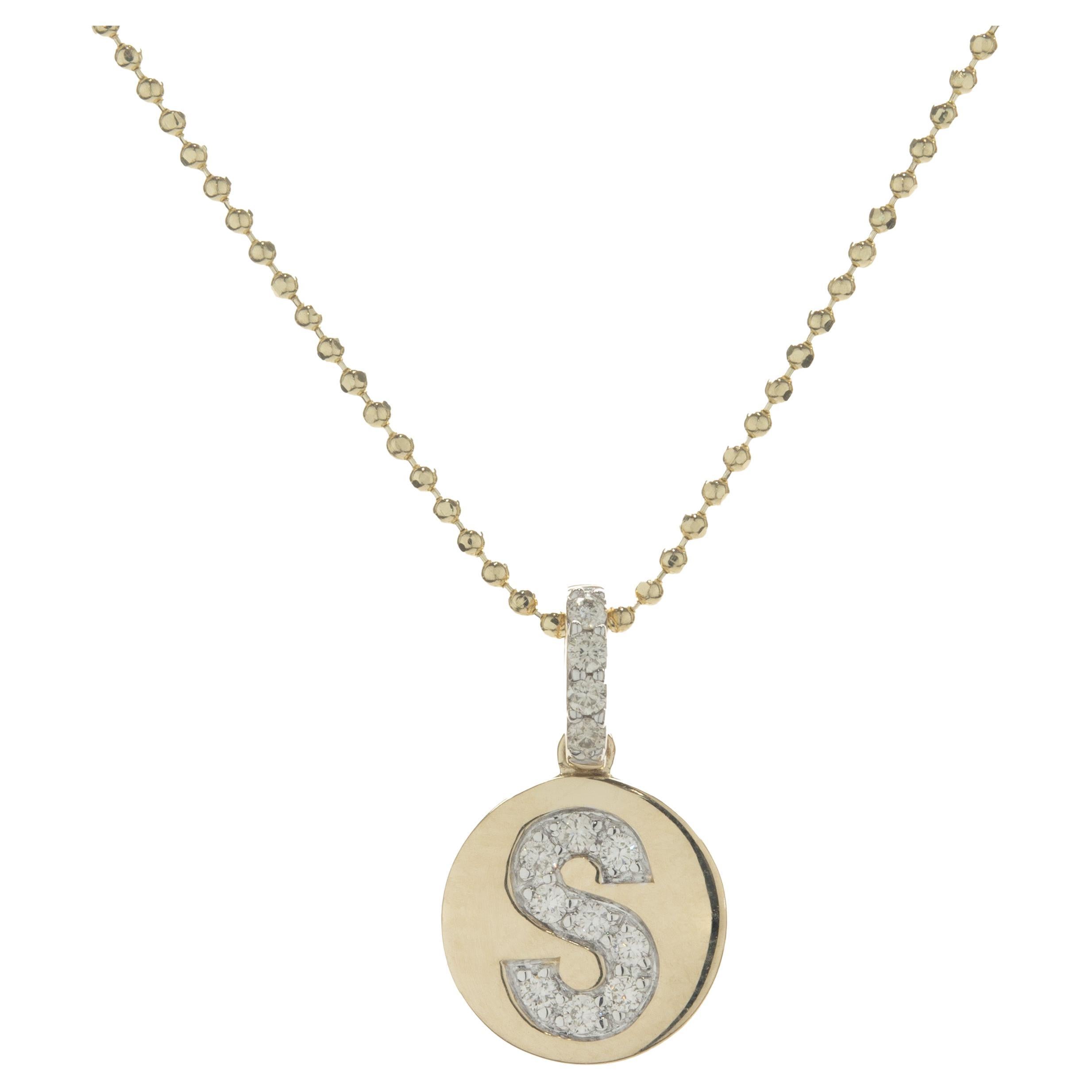 14 Karat Yellow Gold Diamond “S” Necklace For Sale