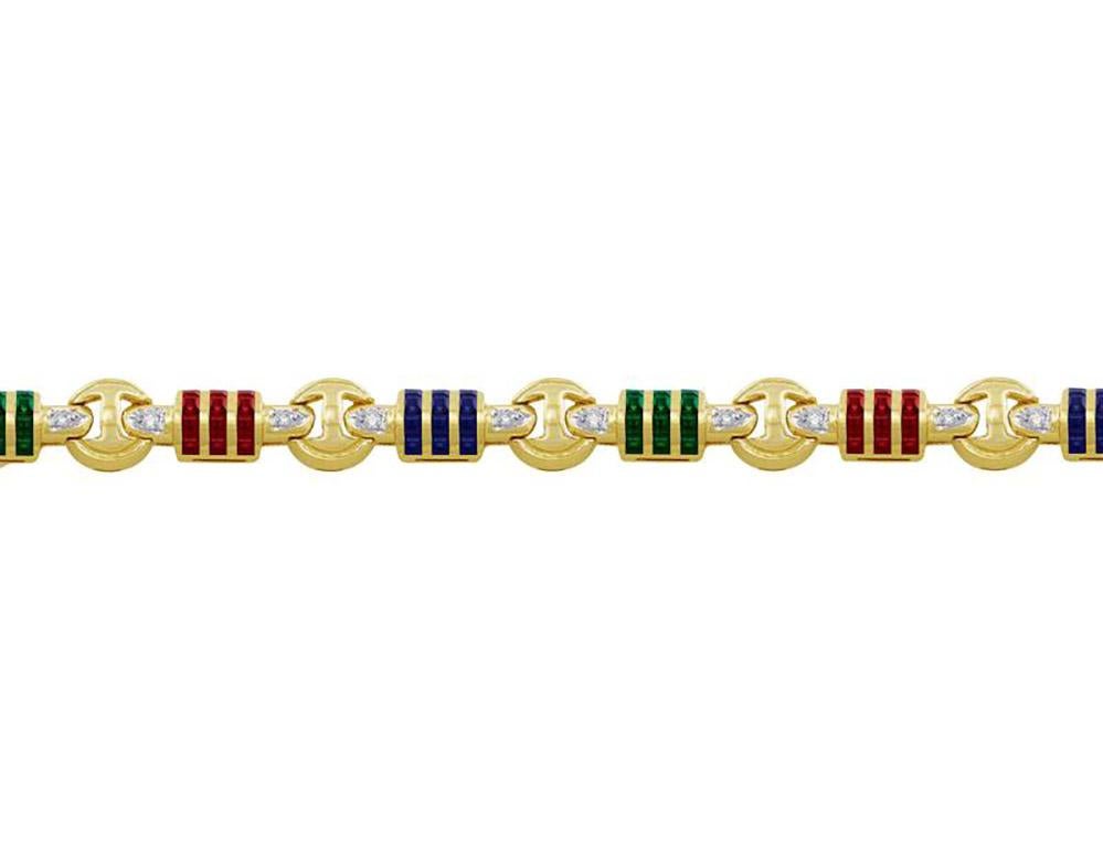 14kt yellow gold diamond, sapphire, emerald and ruby bracelet. Approximately 0.22ctw of diamonds, 0.48ctw of sapphires, 0.36ctw of rubies and emeralds.