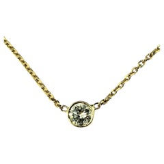 Ciondolo con diamante solitario in oro giallo 14 carati #17452