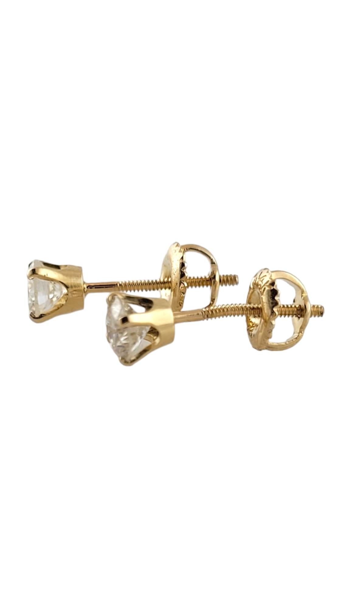These sparkling earrings each feature one round brilliant cut diamond set in 14K yellow gold. Screw back closures.

Total diamond weight: .71 ct.

Diamond color: I

Diamond clarity: SI-1

Size: 5 mm

Weight: 1.0 gr./ .6 dwt.

Tested 14K gold

JAGi