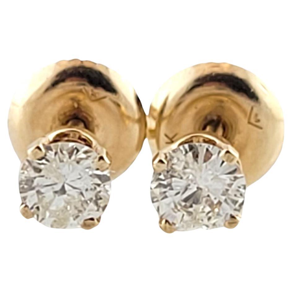 14 Karat Yellow Gold Diamond Stud Earrings #14699