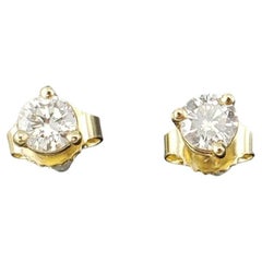 14 Karat Yellow Gold Diamond Stud Earrings #17425