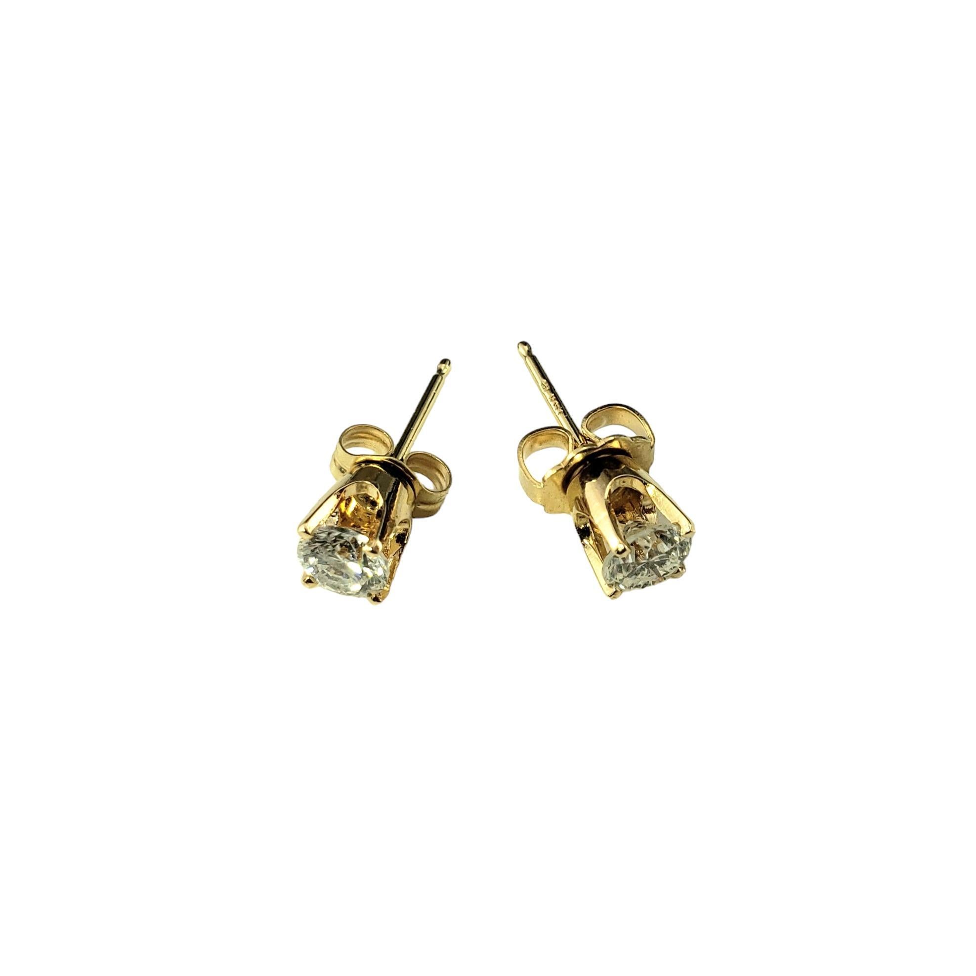 14 Karat Yellow Gold Diamond Stud Earrings-

These sparkling stud earrings each feature one round brilliant cut diamond set in classic 14K yellow gold.  Push back closures.

Approximate total diamond weight:  .56 ct.

Diamond color: H-I

Diamond