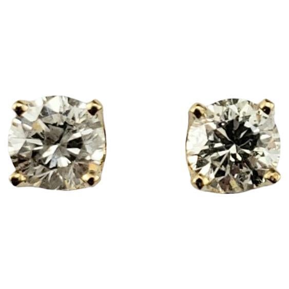 14 Karat Yellow Gold Diamond Stud Earrings #17533