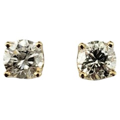 14 Karat Yellow Gold Diamond Stud Earrings #17533