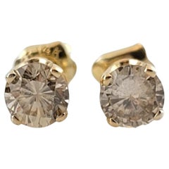 14 Karat Yellow Gold Diamond Stud Earrings #17773