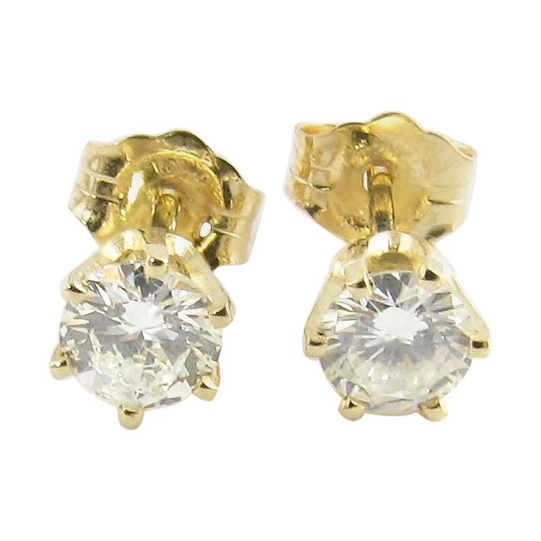14 Karat Yellow Gold .95 Carat Diamond Stud Earrings at 1stDibs