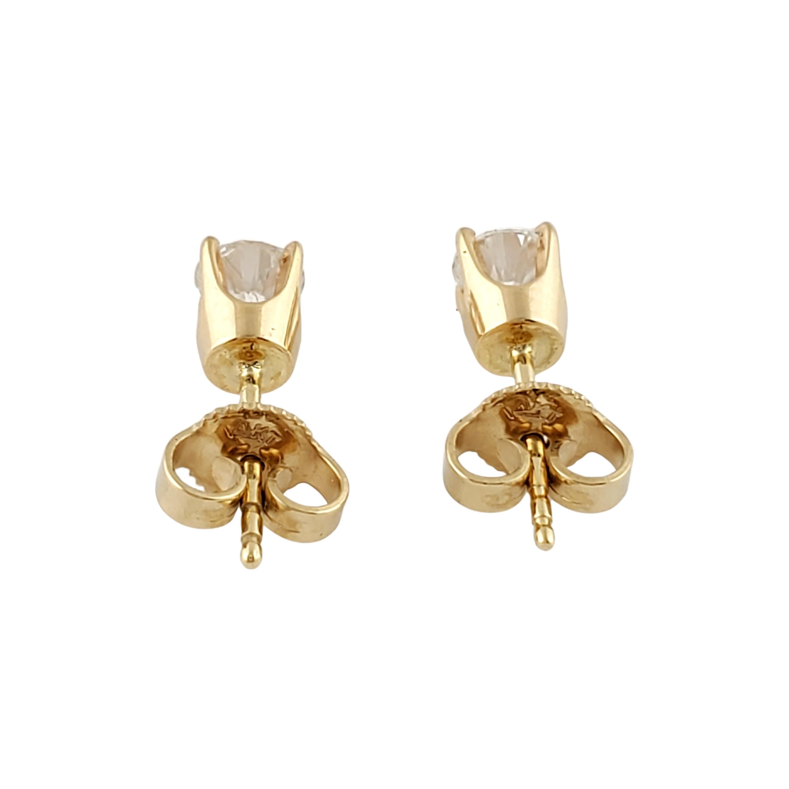 14 Karat Yellow Gold Diamond Stud Earrings .60 Carat For Sale 1