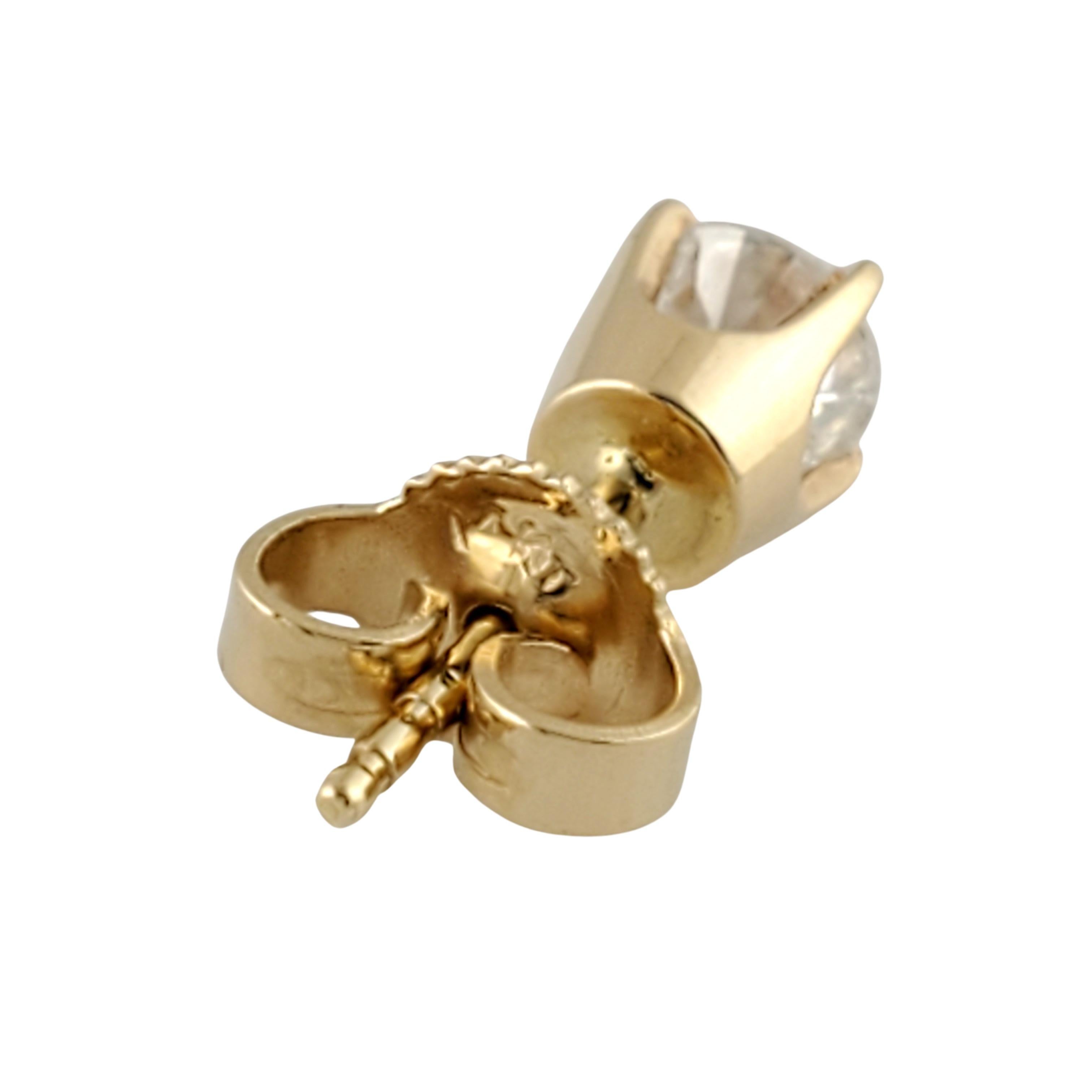 14 Karat Yellow Gold Diamond Stud Earrings .60 Carat For Sale 2