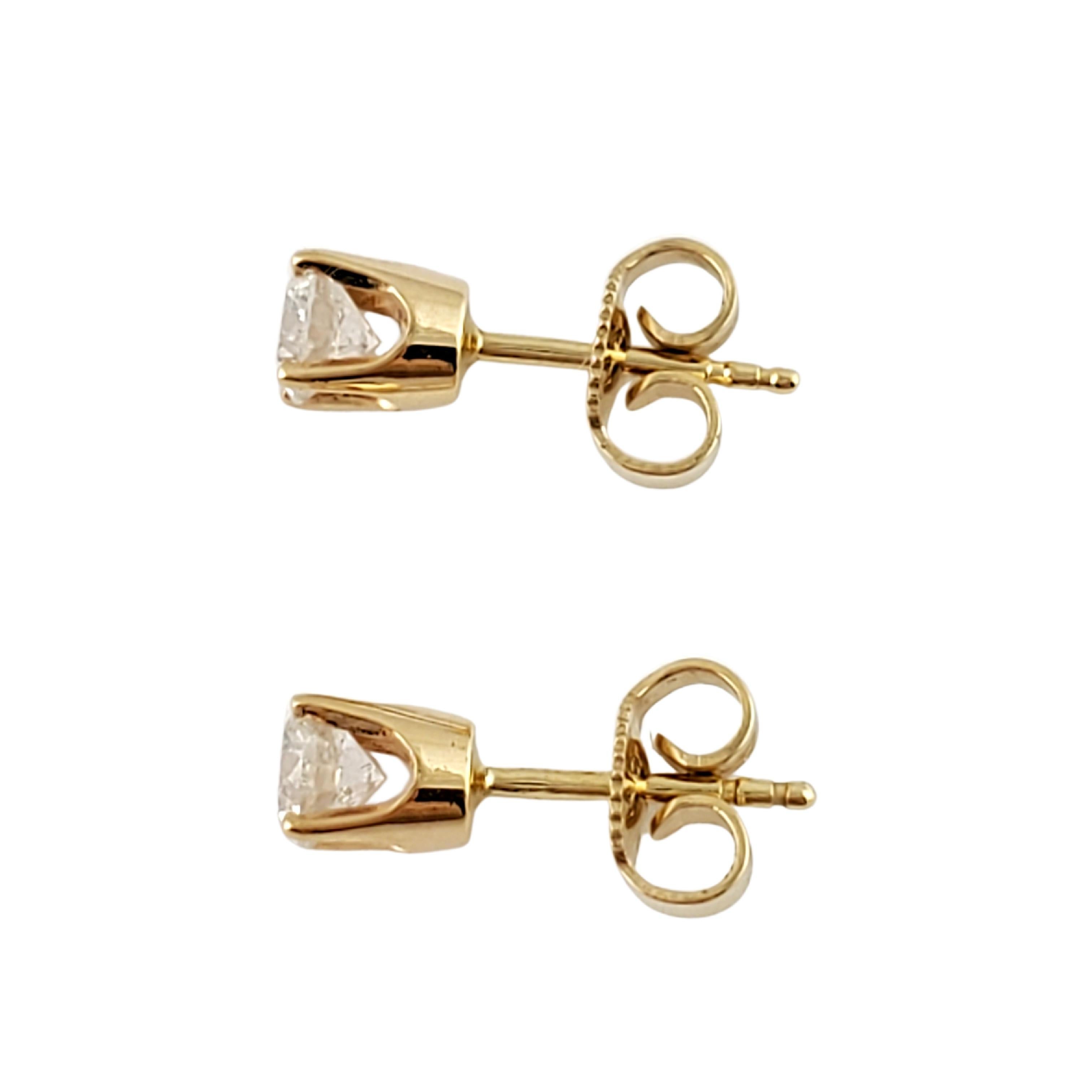 Women's or Men's 14 Karat Yellow Gold Diamond Stud Earrings .60 Carat For Sale