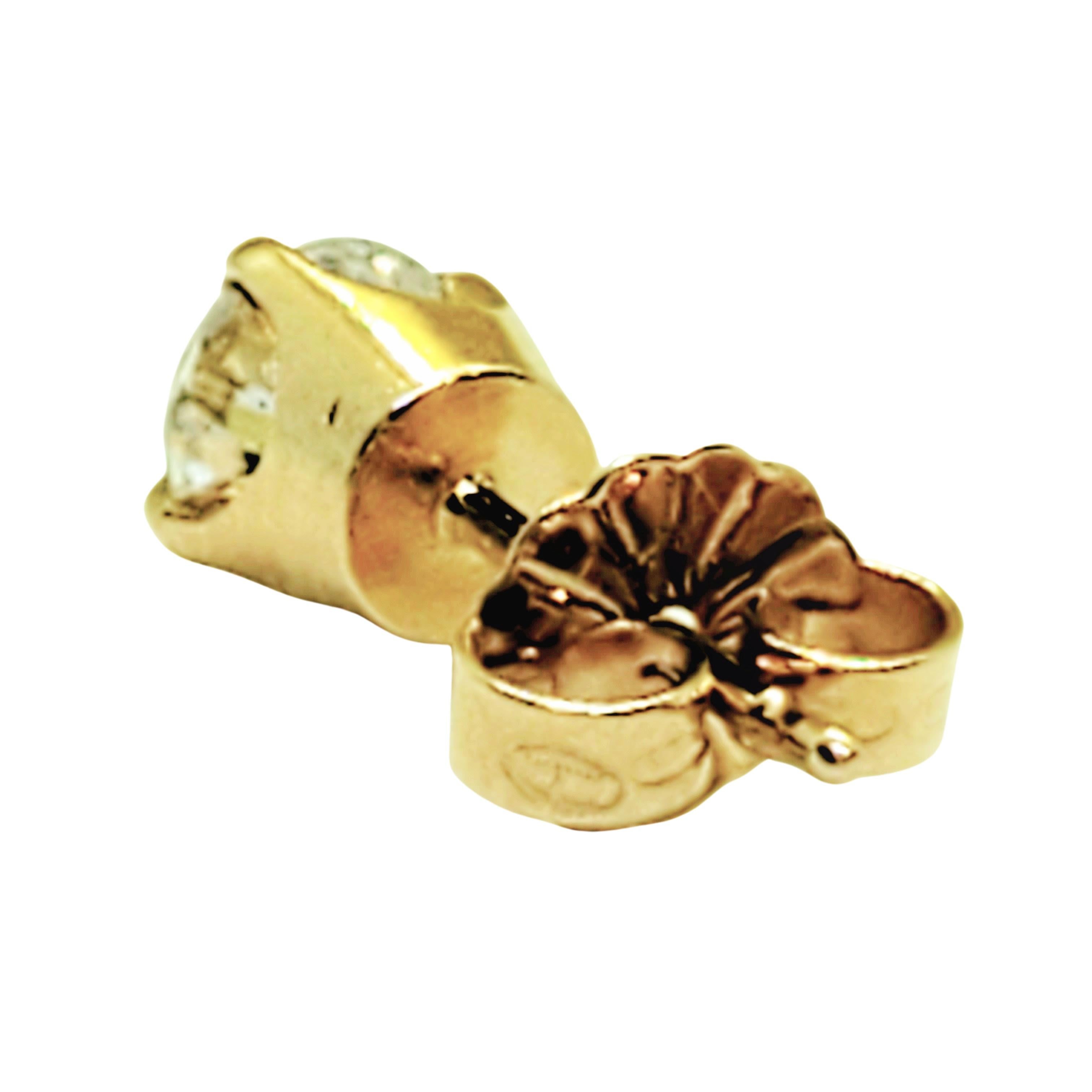 14 Karat Yellow Gold Diamond Stud Earrings .73 Carat For Sale 1