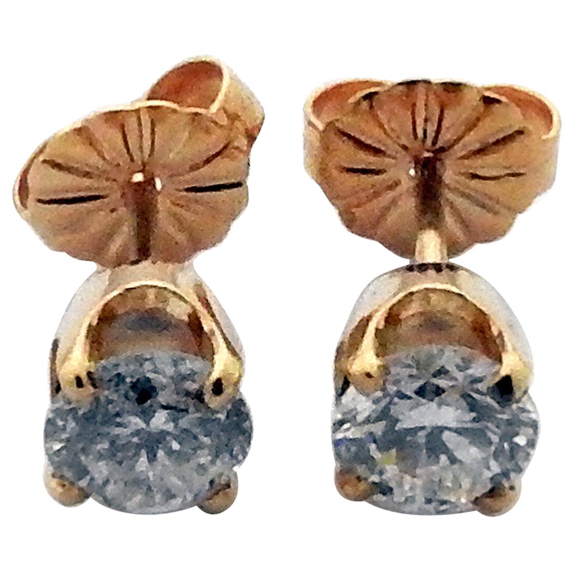 14 Karat Yellow Gold Diamond Stud Earrings .73 Carat For Sale
