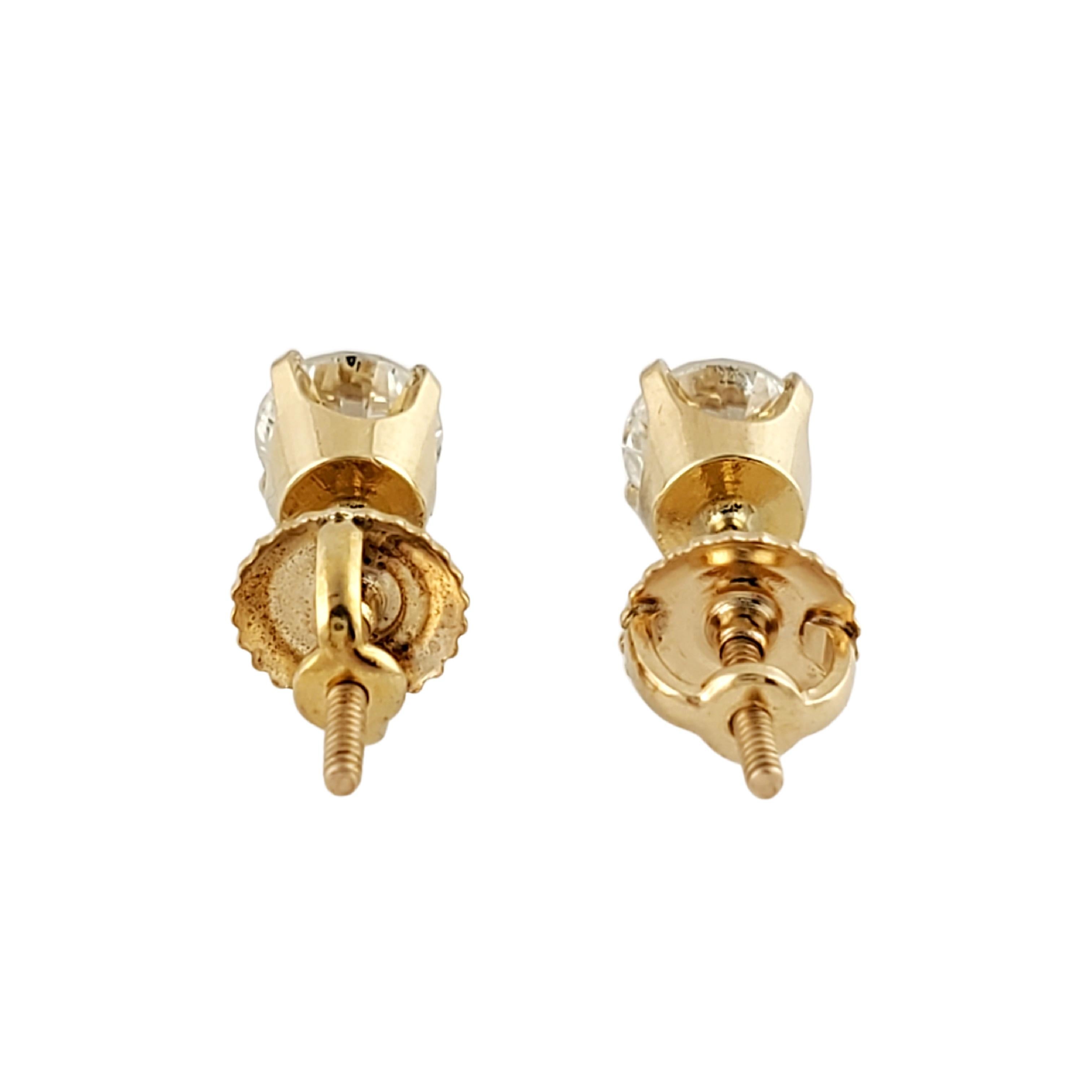 14 Karat Yellow Gold Diamond Stud Earrings .90 Ct. twt In Good Condition In Washington Depot, CT