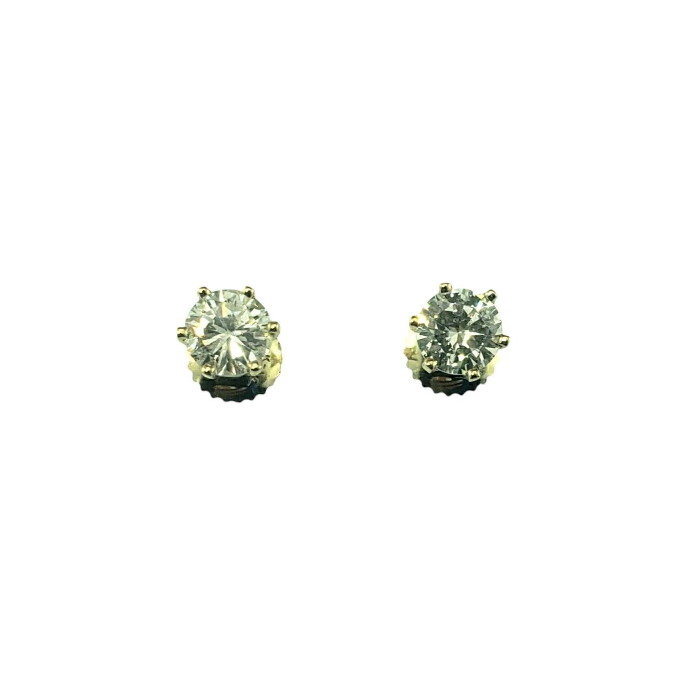 14 Karat Yellow Gold Diamond Stud Earrings .94cttw. #19497