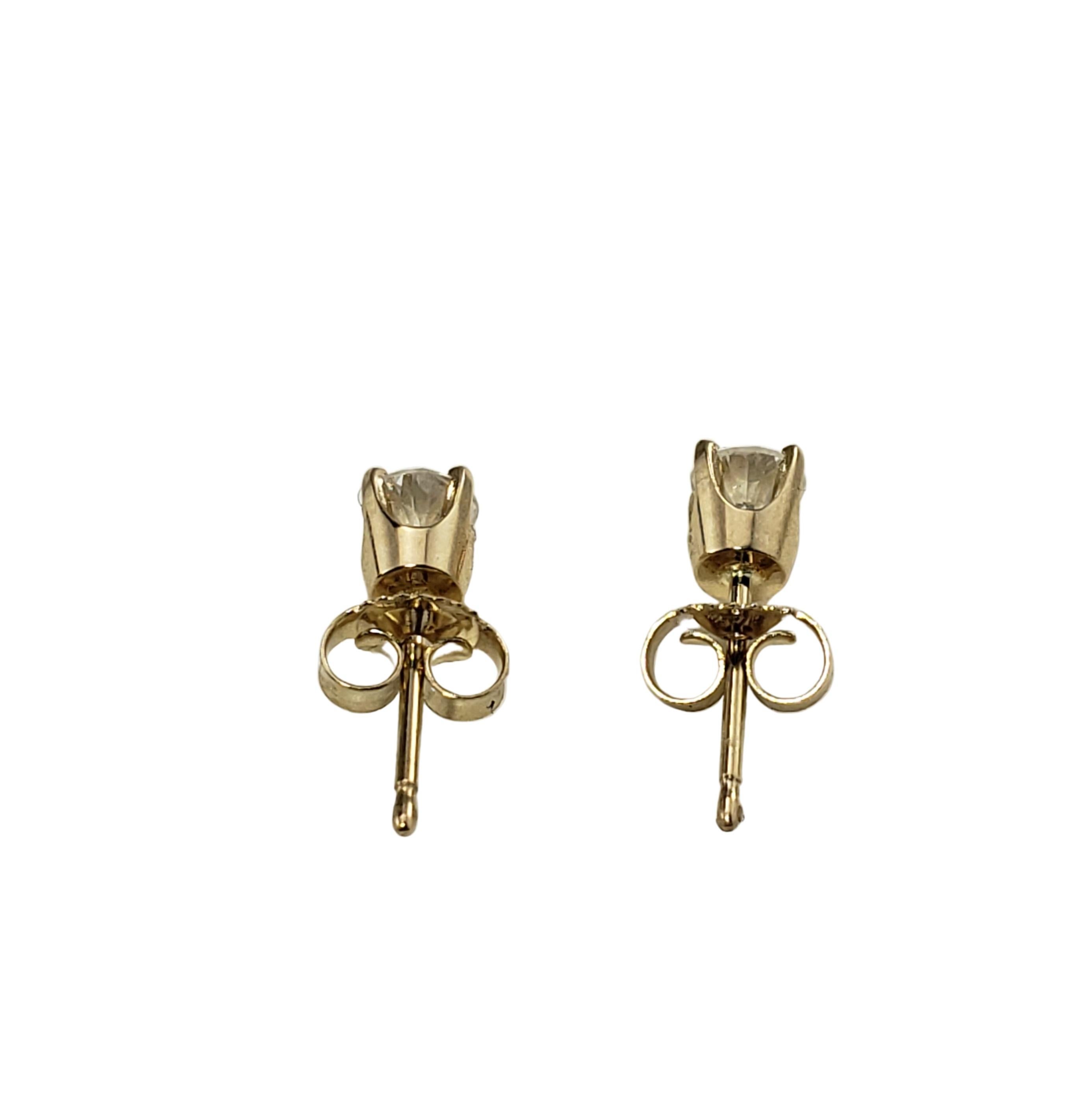 Women's 14 Karat Yellow Gold Diamond Stud Earrings For Sale