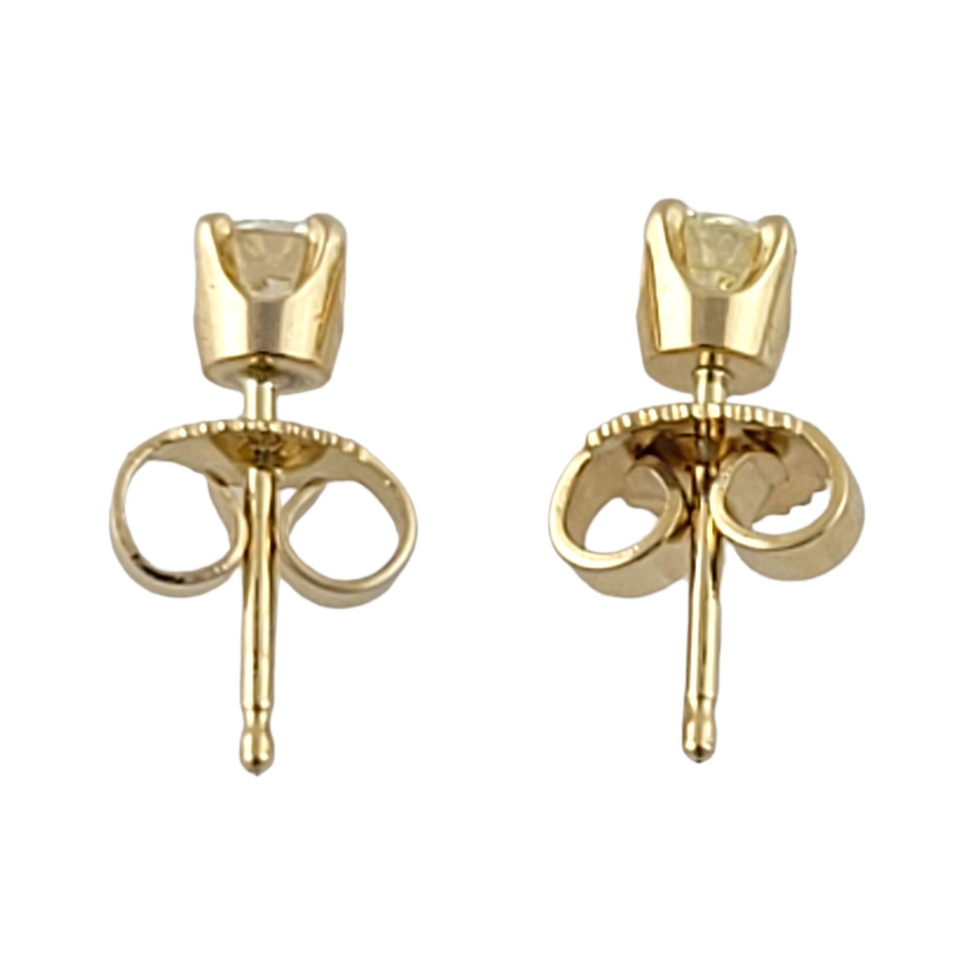 14 Karat Yellow Gold Diamond Stud Earrings For Sale 3