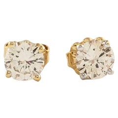 Orecchini con diamante in oro giallo 14 carati