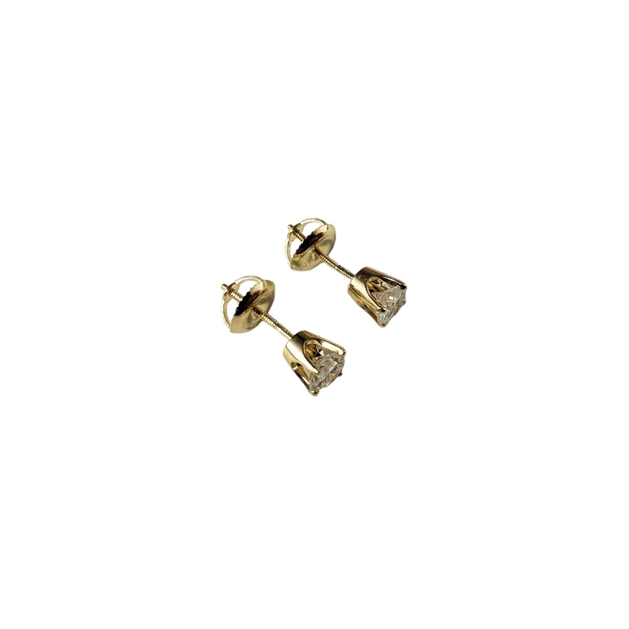 Vintage 14 Karat Yellow Gold Diamond Stud Earrings JAGi Certified-

These sparkling stud earrings each feature one round brilliant cut diamond set in classic 14K yellow gold.
Screw back closures.

Total diamond weight: .73 ct.

Diamond color: