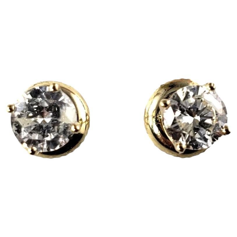 14 Karat Yellow Gold Diamond Stud Earrings #14029
