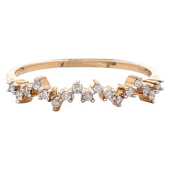 14 Karat Yellow Gold Diamond Swirl Band 0.09 Carats