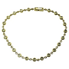 Bracelet tennis en or jaune 14 carats et diamants n°16402