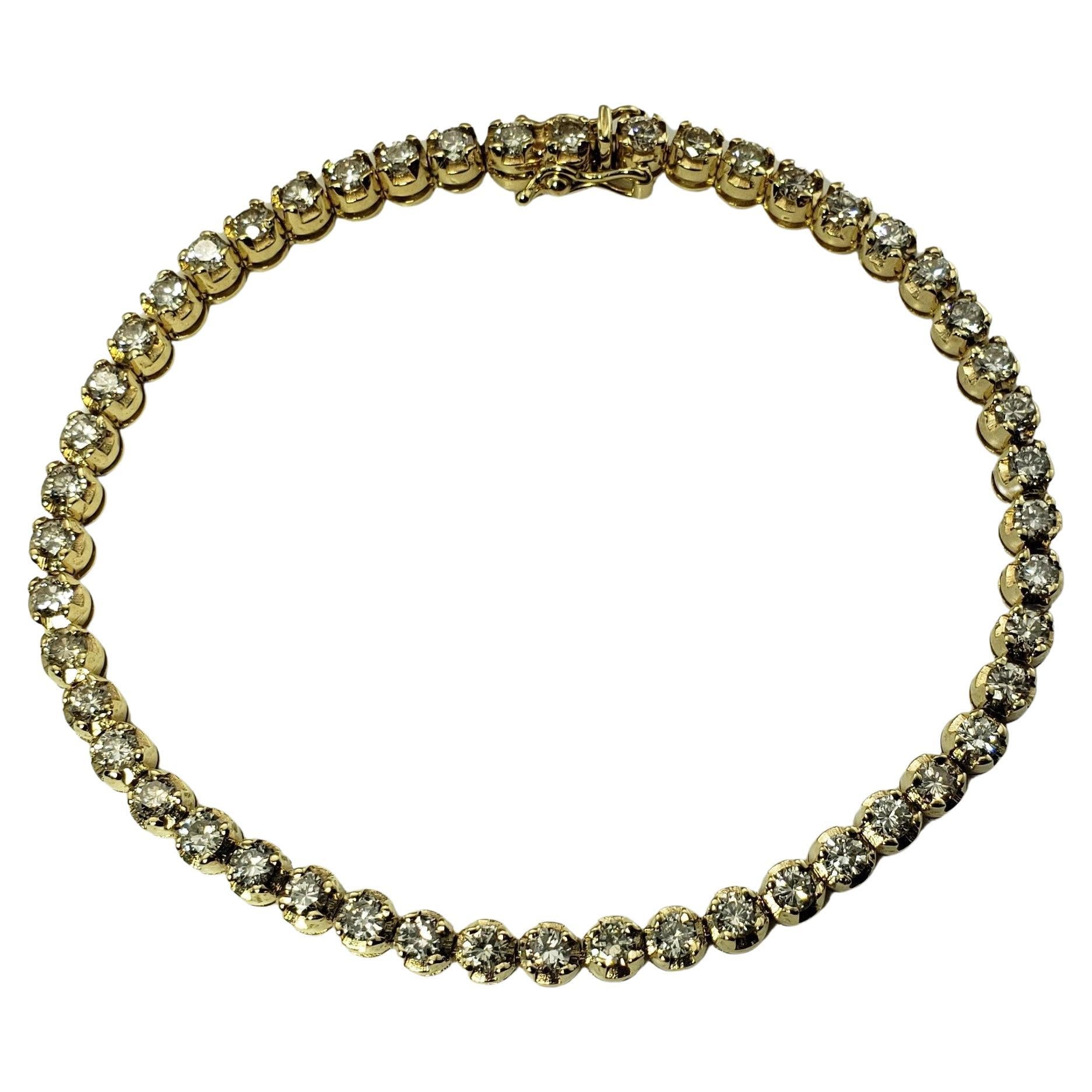 Bracciale tennis con diamanti in oro giallo 14 carati, peso totale 3,0 carati in vendita