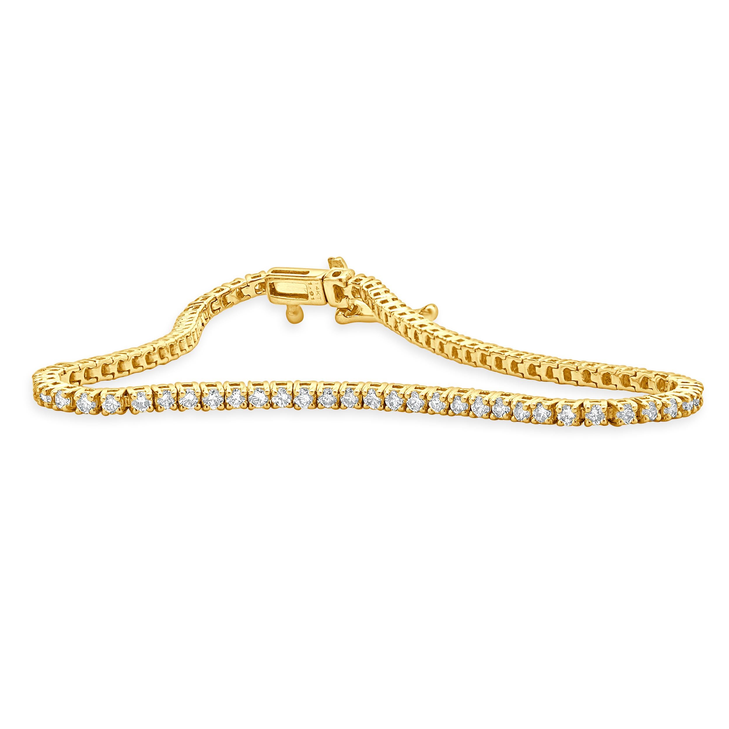 Designer: custom
Material: 14K yellow gold
Diamond: 78 round brilliant cut = 1.92cttw
Color: I
Clarity: SI1
Dimensions: bracelet will fit up to a 7-inch wrist
Weight: 6.30 grams