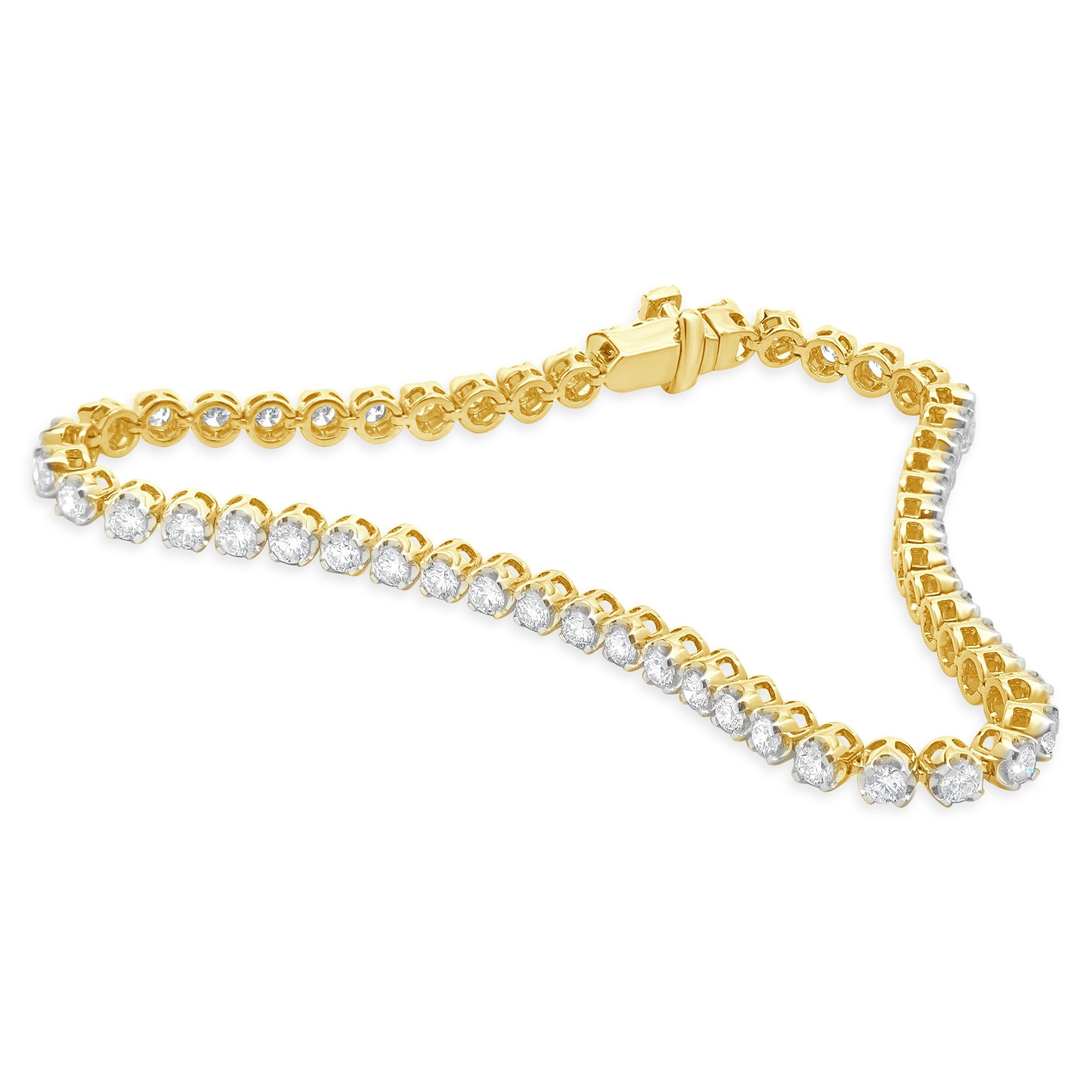 MATERIAL: 14K Gelbgold
Diamanten: 53 runder Brillantschliff = 2,65cttw
Farbe: G / H
Klarheit: SI1
Abmessungen: Das Armband passt an ein Handgelenk von bis zu 7 Zoll 
Gewicht: 8.59 Gramm