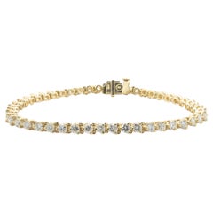 14 Karat Yellow Gold Diamond Tennis Bracelet