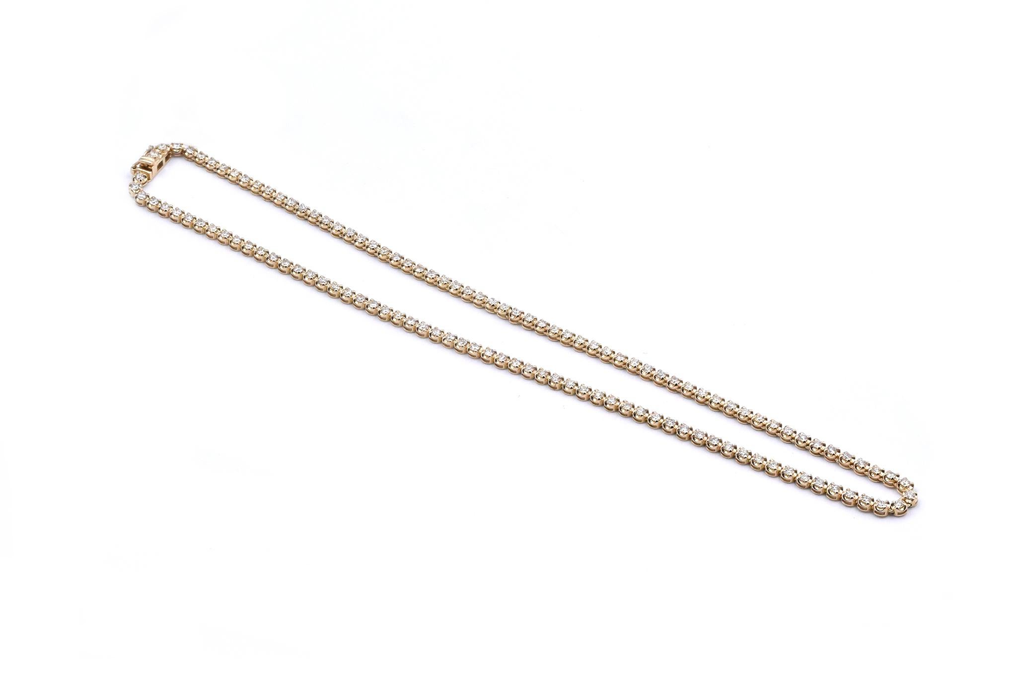 Material: 14K yellow gold
Diamonds: 121 round brilliant cut = 5.46cttw
Color: G
Clarity: VS2
Dimensions: necklace measures 16-inches
Weight: 14.18 grams
