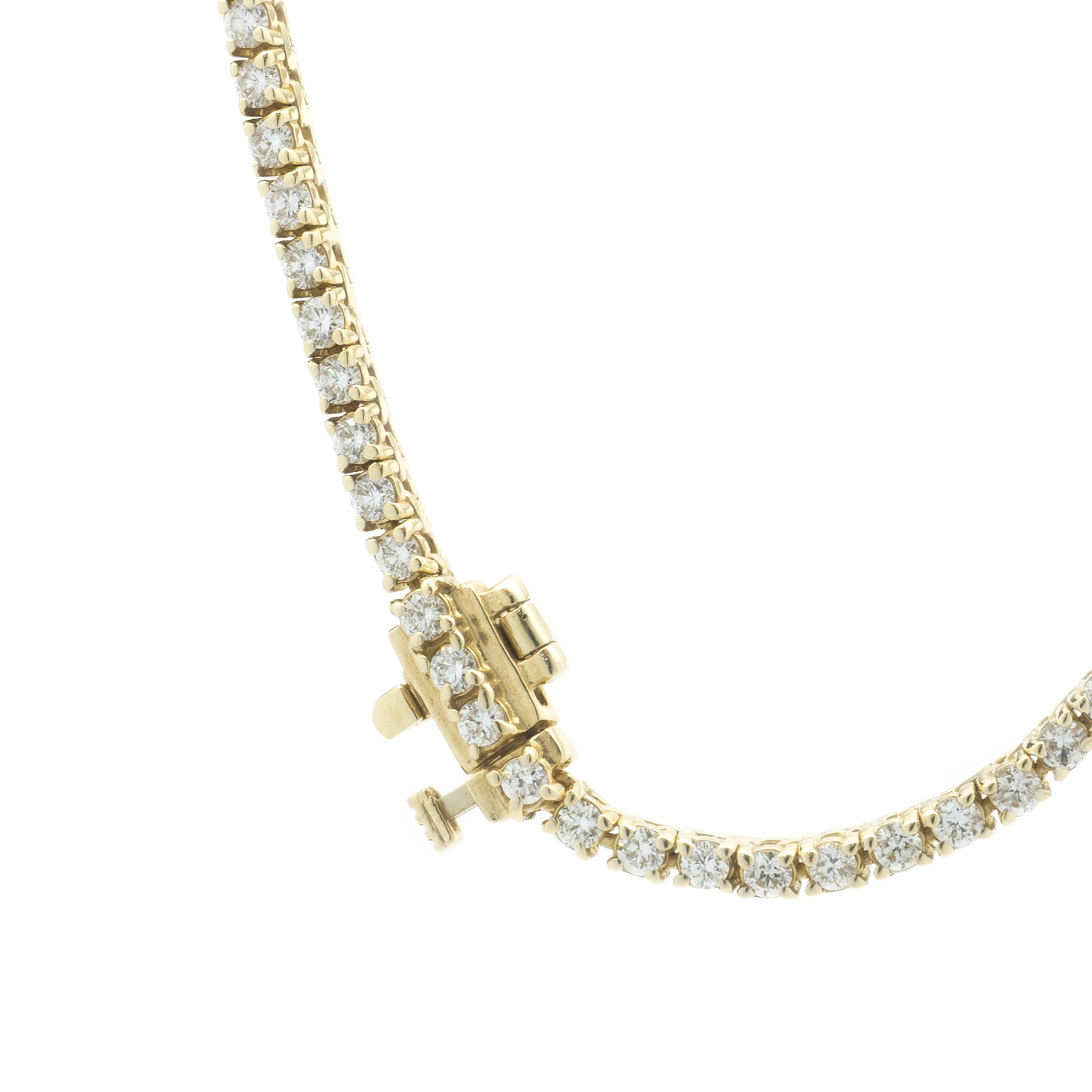 Designer: custom
Material: 14K yellow gold
Diamonds: 161 round brilliant cut = 6.77cttw
Color: H
Clarity: VS1
Dimensions: necklace measures 17-inches
Weight: 20.37 grams
