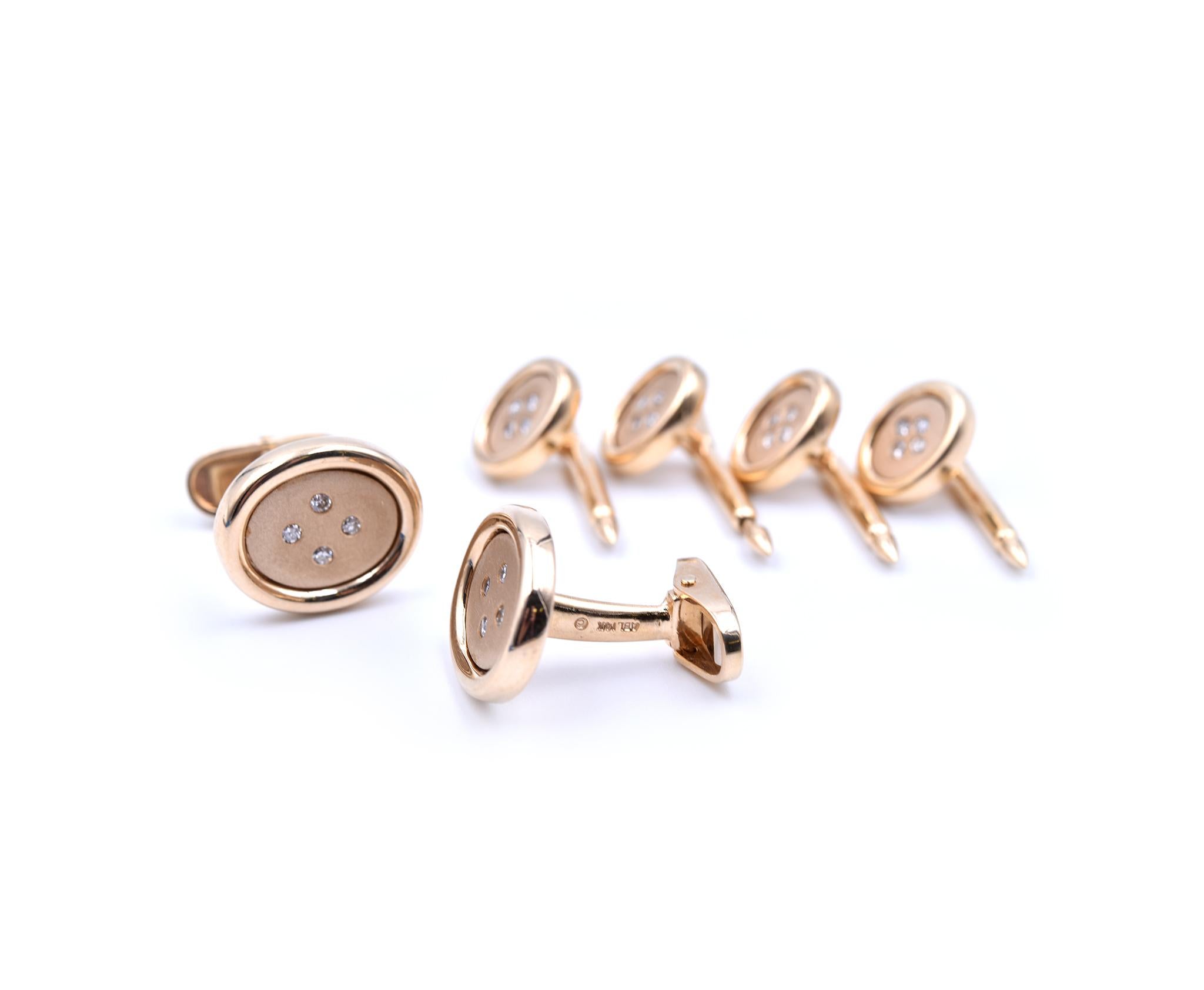 Material: 14k yellow gold
Diamonds: 24 round cuts = 0.36 carat total weight
Dimensions: each cufflink measures 14.22mm by 16.40mm, each button measures 9.75mm by 11.60mm
Weight: 26.37 grams
