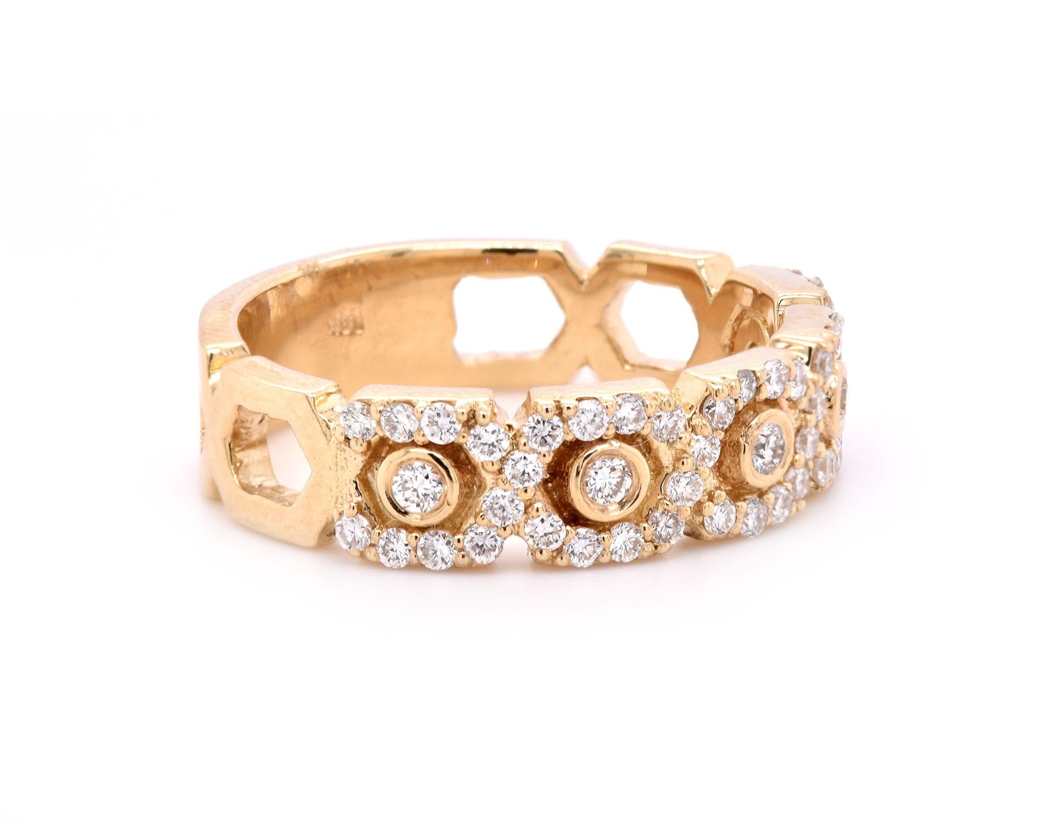 Designer: custom
Material: 14k yellow gold
Diamonds: 45 round brilliant cut = 0.50cttw
Color: G
Clarity: VS
Size: 7 (please allow two additional shipping days for sizing requests)  
Dimensions: ring measures 5.5mm in width
Weight: 5.03 grams