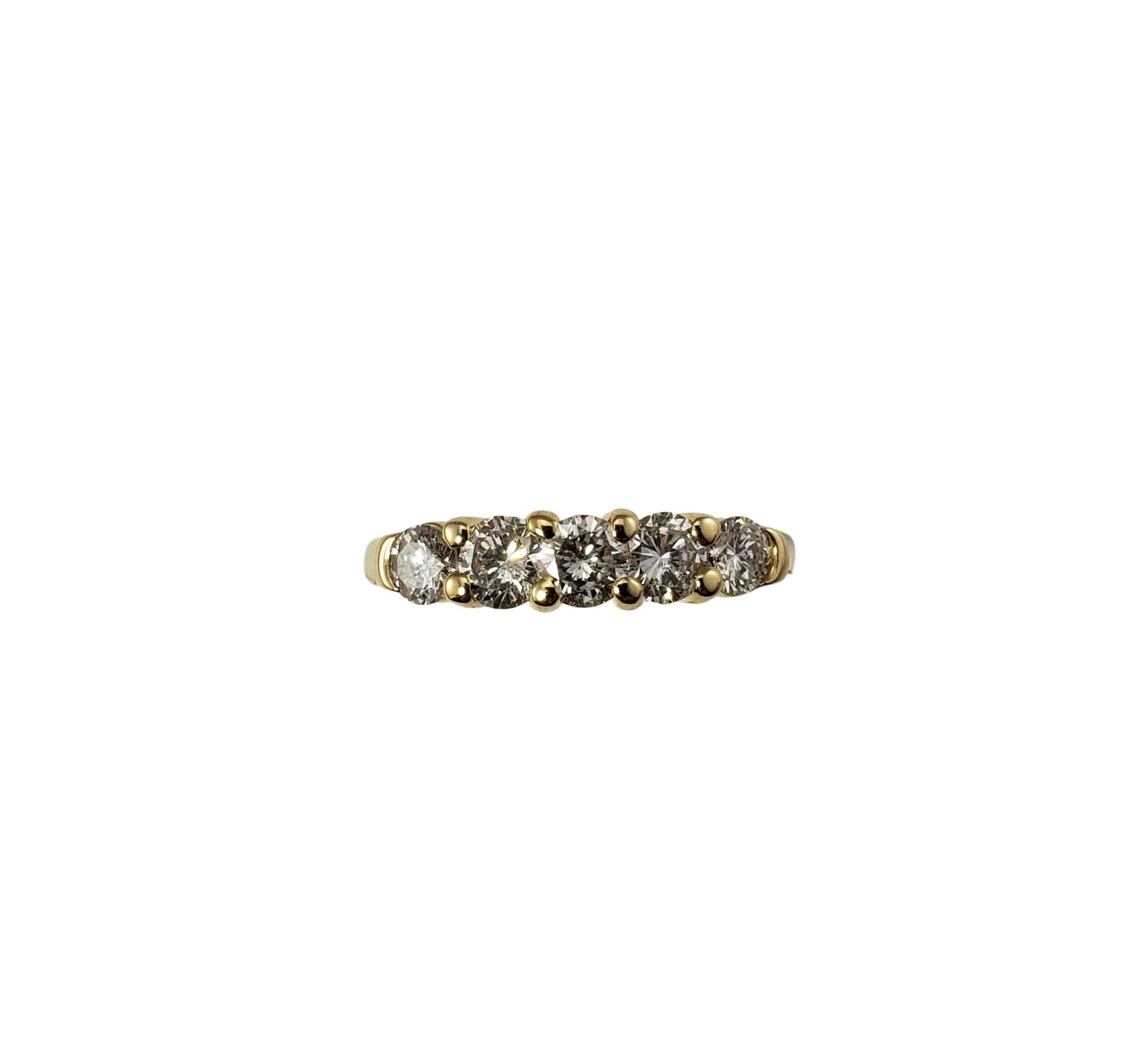 14 Karat Yellow Gold Diamond Wedding Band Ring Size 6.75-

This sparkling ring features five round brilliant cut diamonds set in classic 14K yellow gold.  Shank: 2 mm.  Width:  4 mm.

Approximate total diamond weight:  1.04 ct.

Diamond color: 