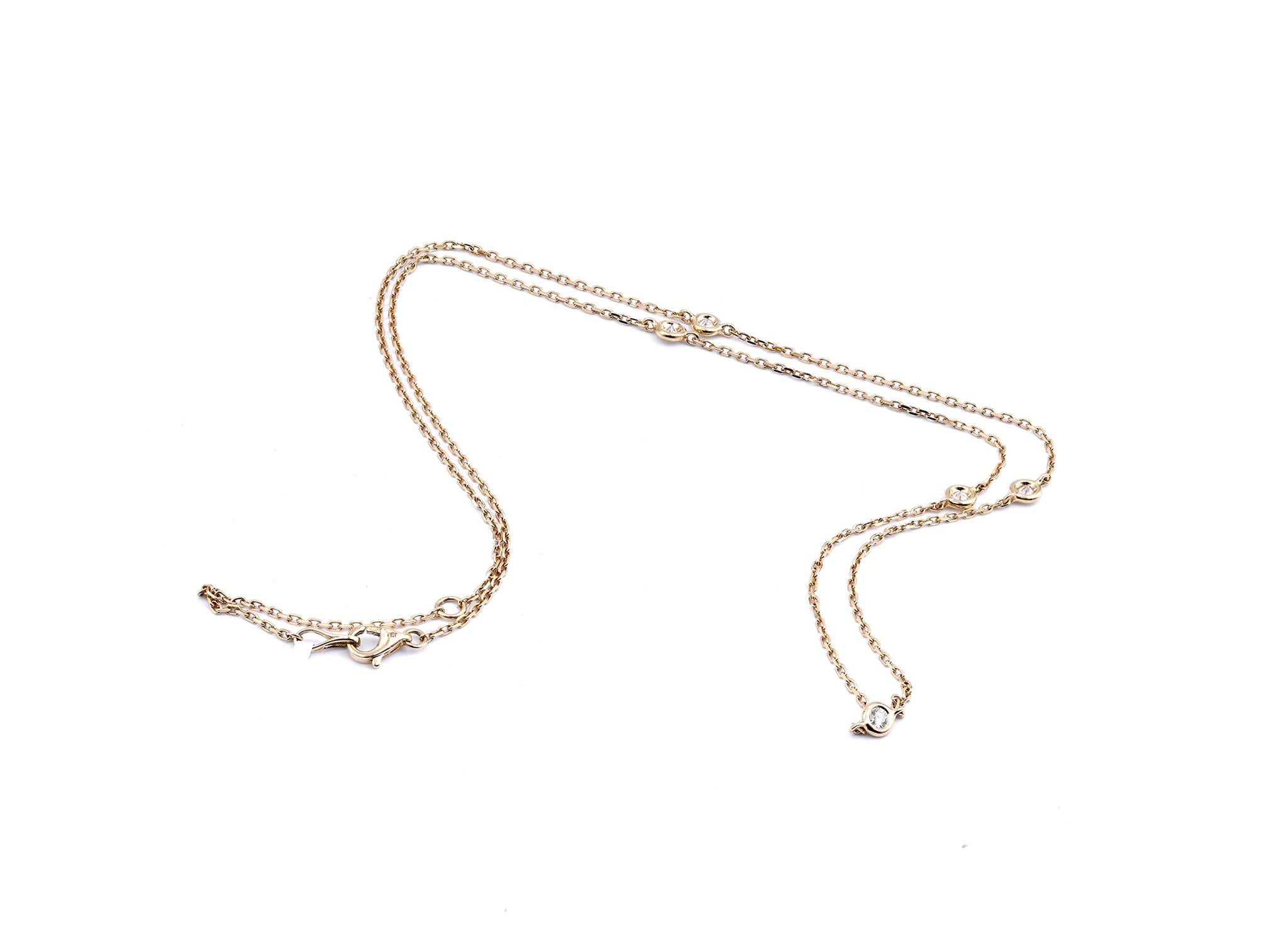 Designer: custom
Material: 14K yellow gold
Diamonds: 5 round cut = .32cttw
Color: G
Clarity: VS
Dimensions: necklace measures 18-20-inches in length 
Weight: 3.39 grams