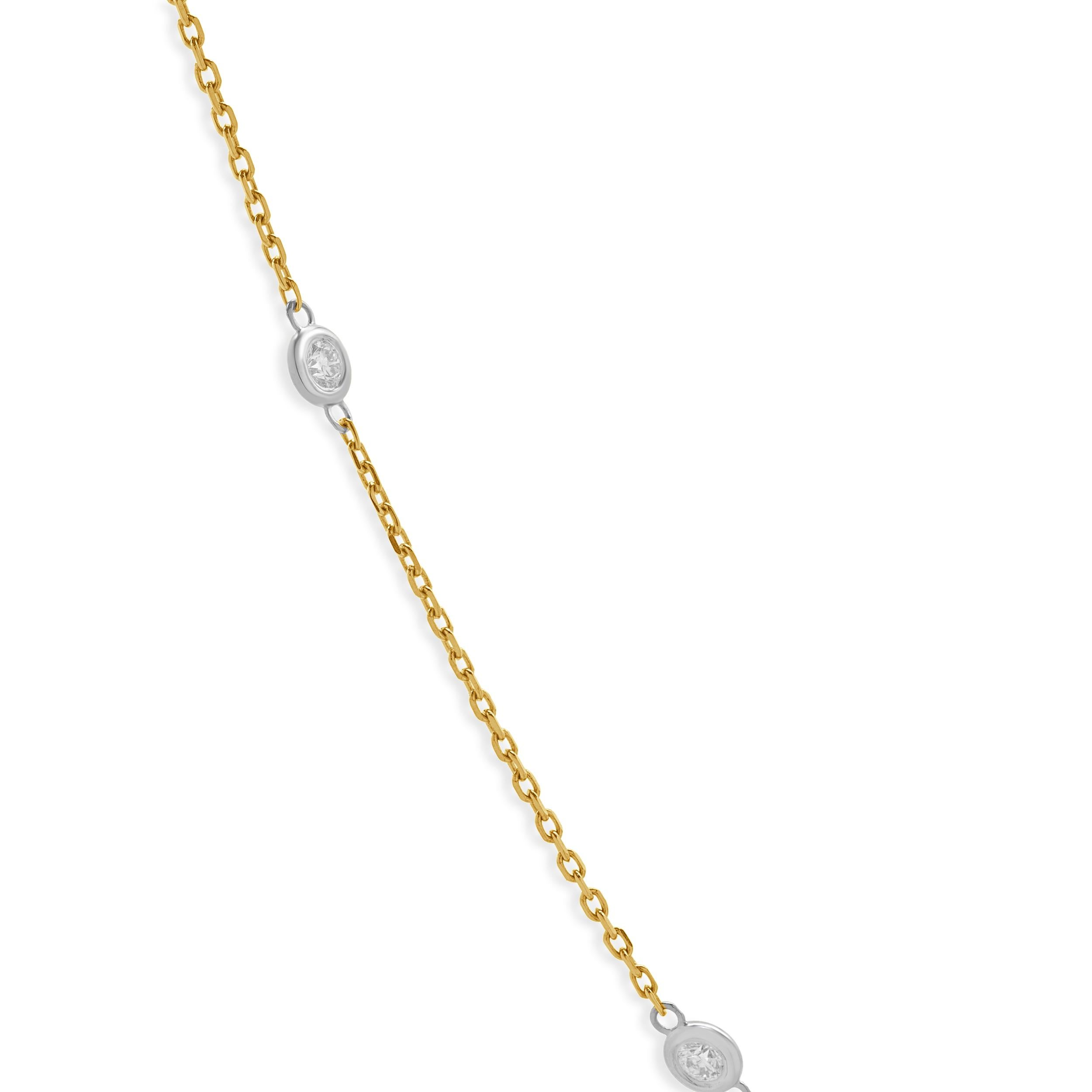 Concepteur : personnalisé
Matière : 14 or jaune
Diamants : 10 diamants ronds de taille brillant = 0,72cttw
Couleur : G
Clarté : VS2
Poids : 3,3 grammes