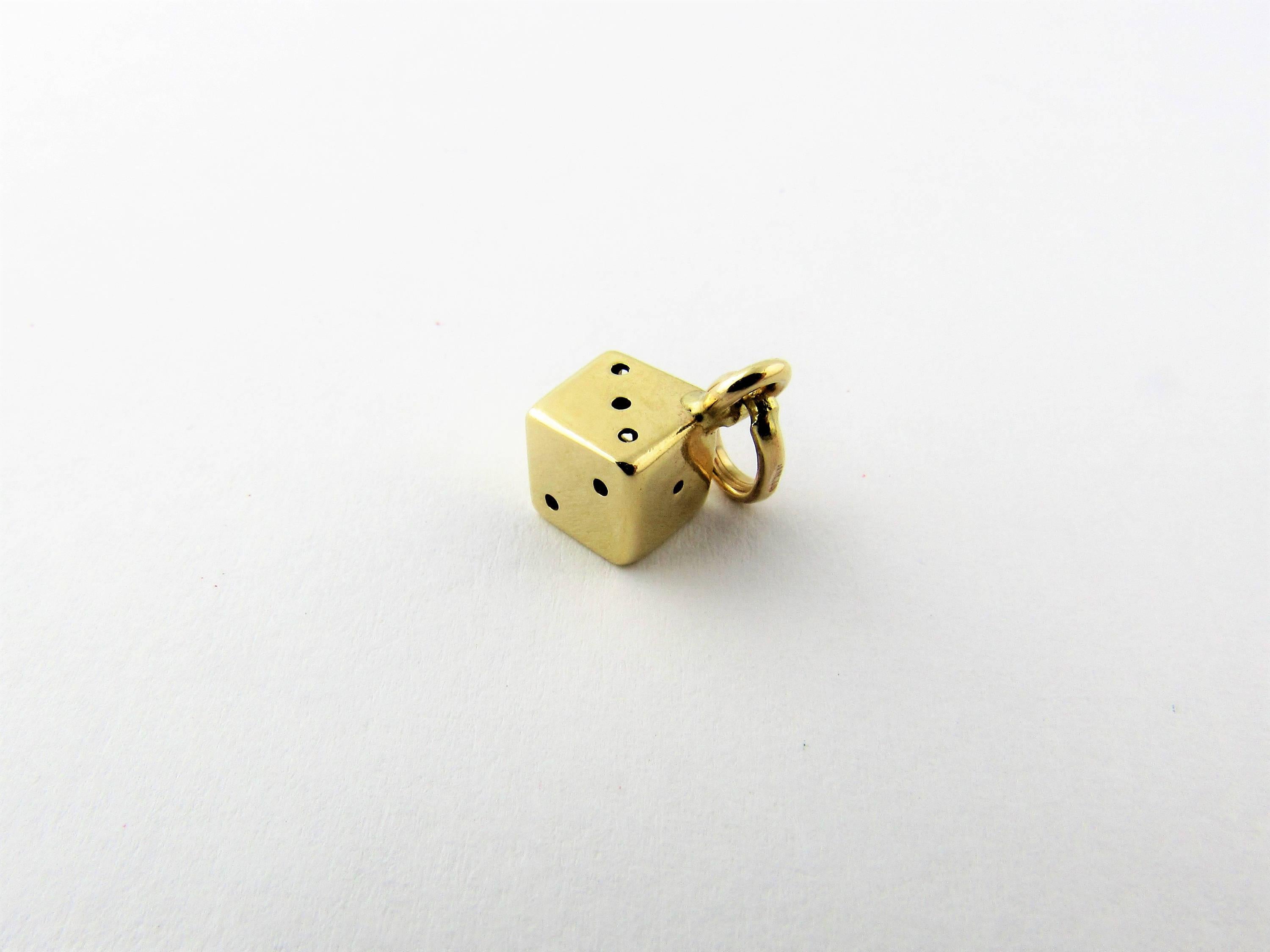 Vintage 14 Karat Yellow Gold Dice Charm

Roll the dice!

This lucky charm features a single die in meticulously detailed 14K yellow gold.

Size: approx 4 mm x 4 mm (actual charm)

Charm hangs approx 12 mm from the top of the loop.

Weight: 0.5 dwt.