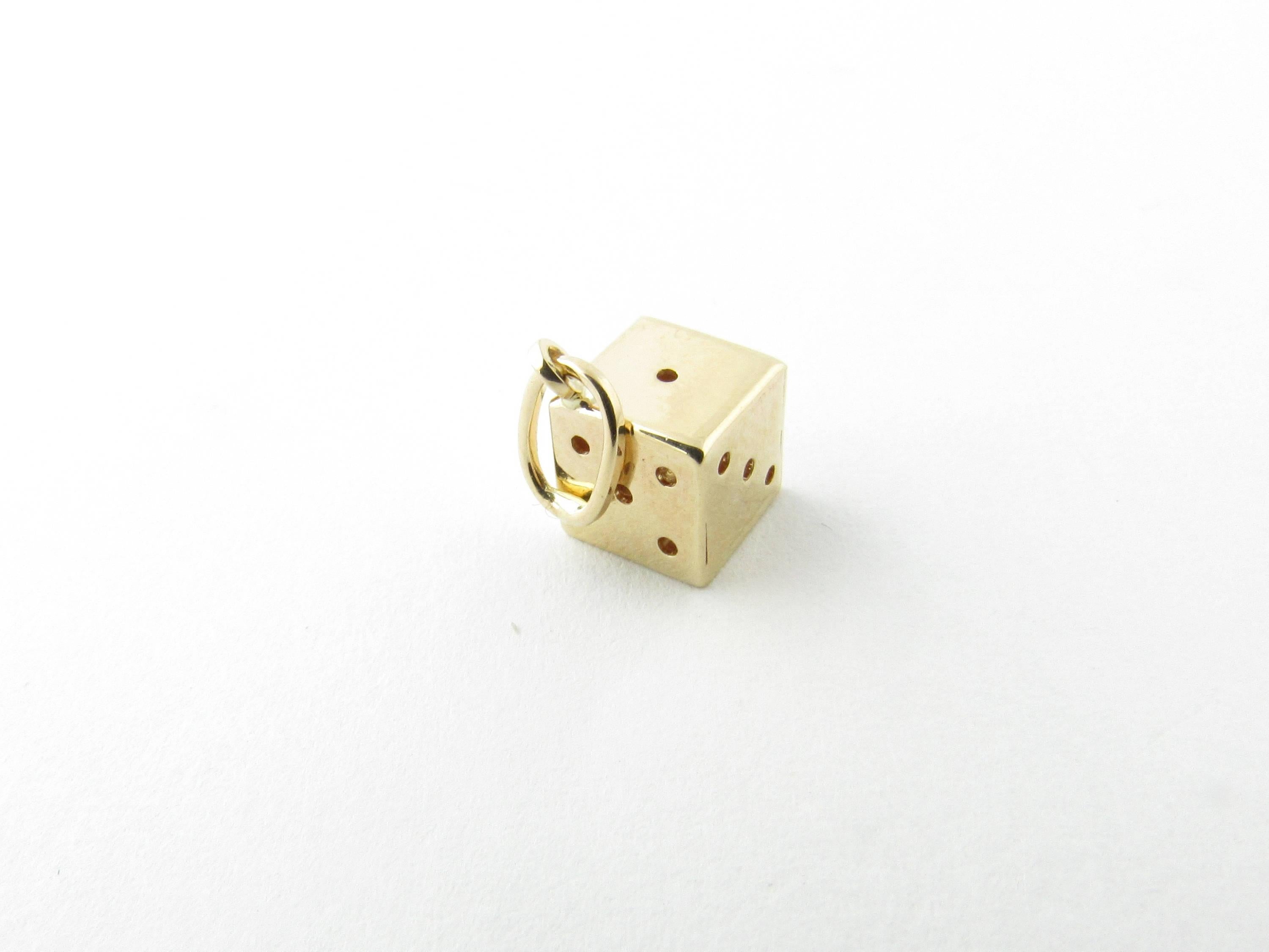 Vintage 14 Karat Yellow Gold Dice Charm

Roll the dice!

This 3D charm features a single die beautifully detailed in 14K yellow gold.

Size: 6 mm x 6 mm (actual charm)

Weight: 0.4 dwt. / 0.7 gr.

Hallmark: 14K

Very good condition, professionally