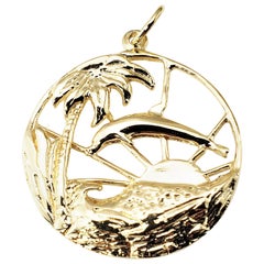 14 Karat Yellow Gold Dolphin Sunset Palm Tree Pendant