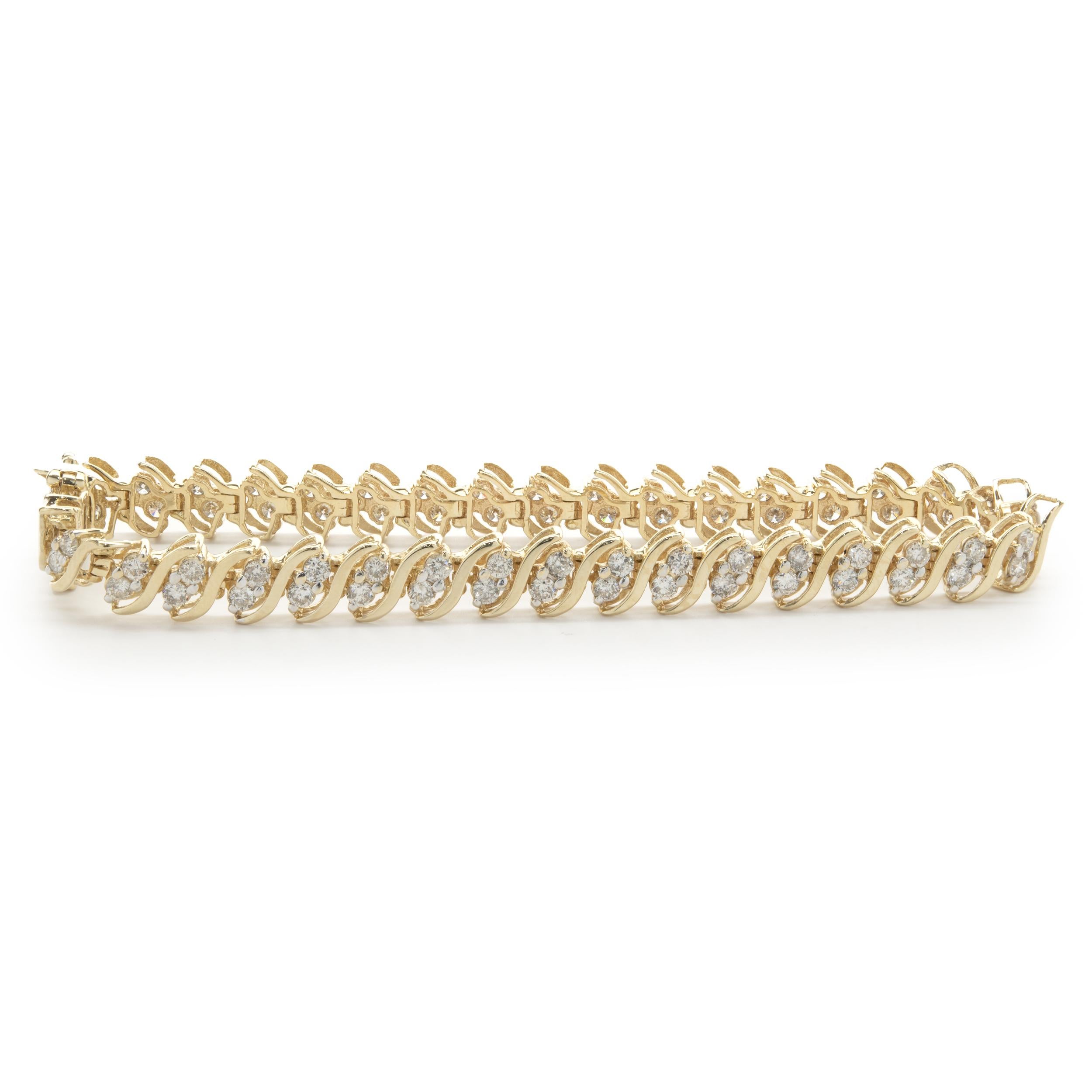 Designer: custom
Material: 14K yellow gold
Diamond: 76 round brilliant= 4.56cttw
Color: G / H
Clarity: SI1-2
Dimensions: bracelet will fit up to a 7-inch wrist
Weight: 16.62 grams
