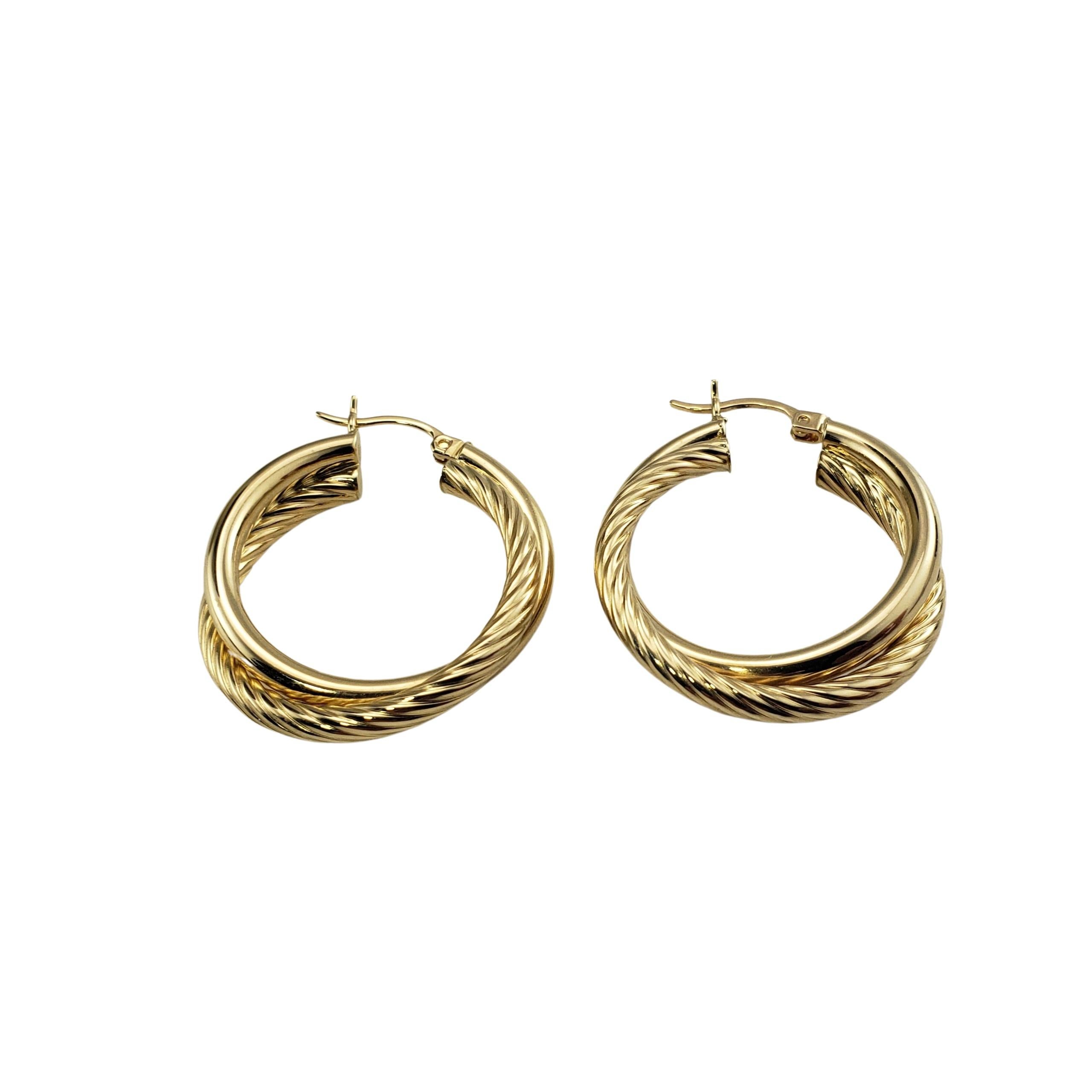 Boucles d'oreilles à double anneau en or jaune 14 carats en vente 1